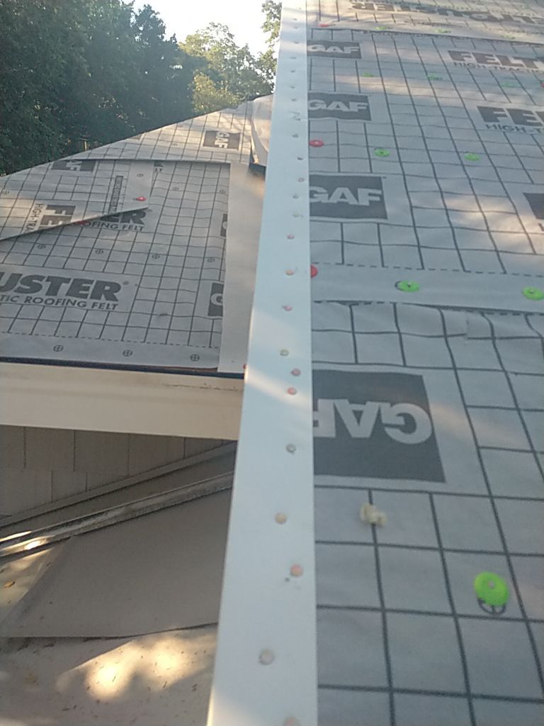 Residential Roofing Installation using Roof Replacement by American Roofing & Construction LLC