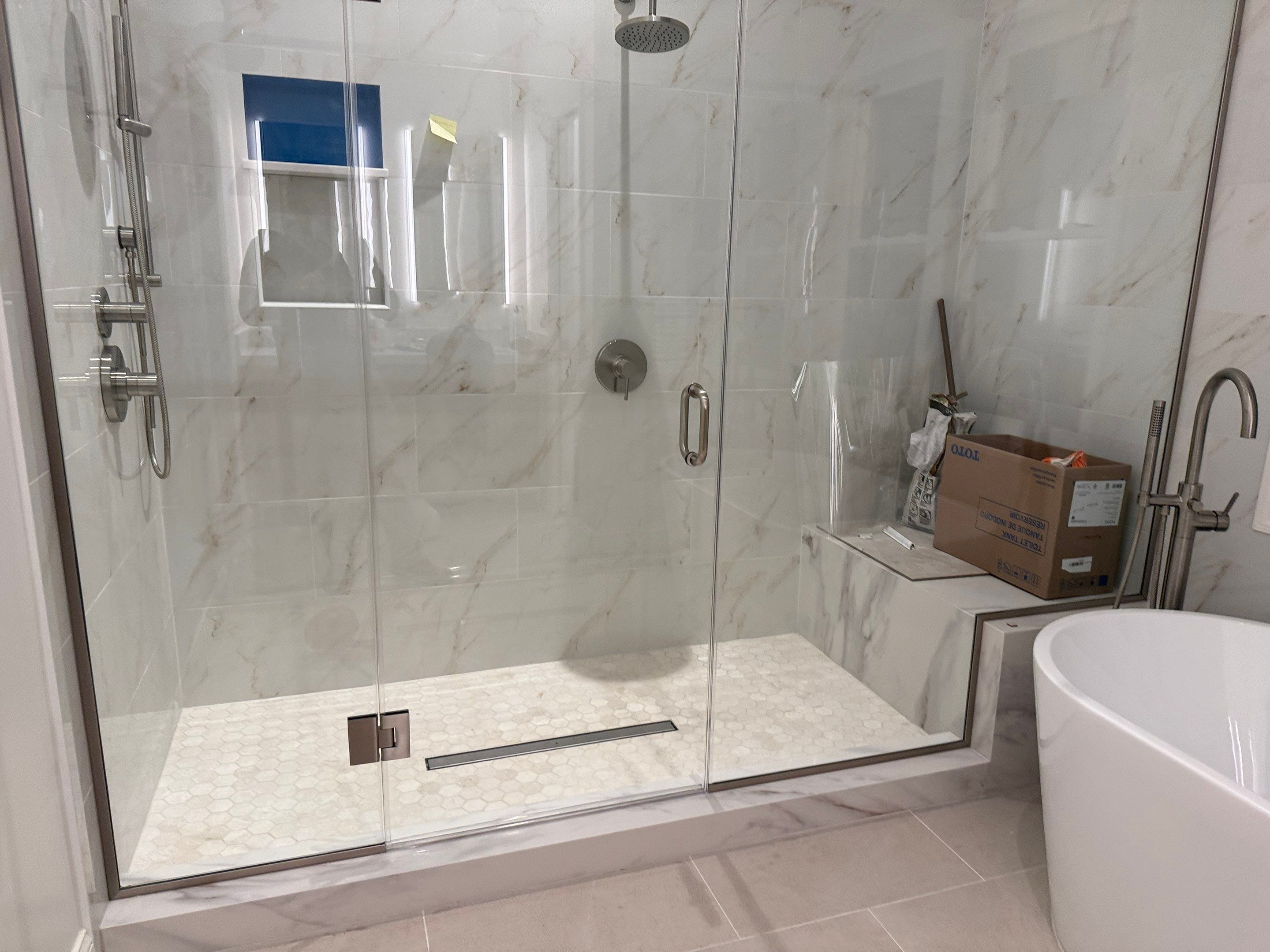 Bathroom Remodel using Tile by Home Concepts Construction