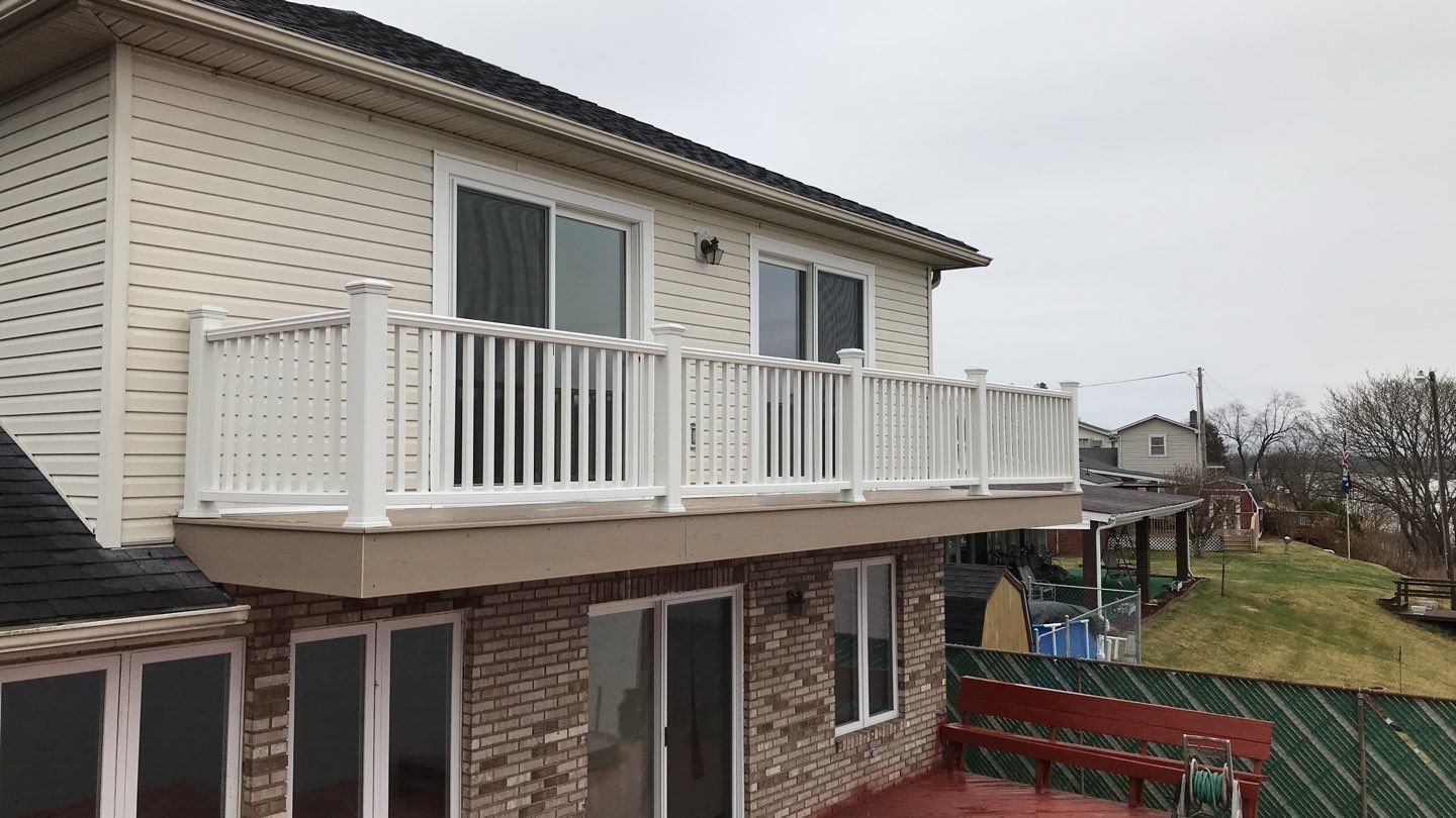 Deck Refurbush and Door Replacement using Trex Decking and Railing. Polaris Patio Doors by Secure Construction Company Inc