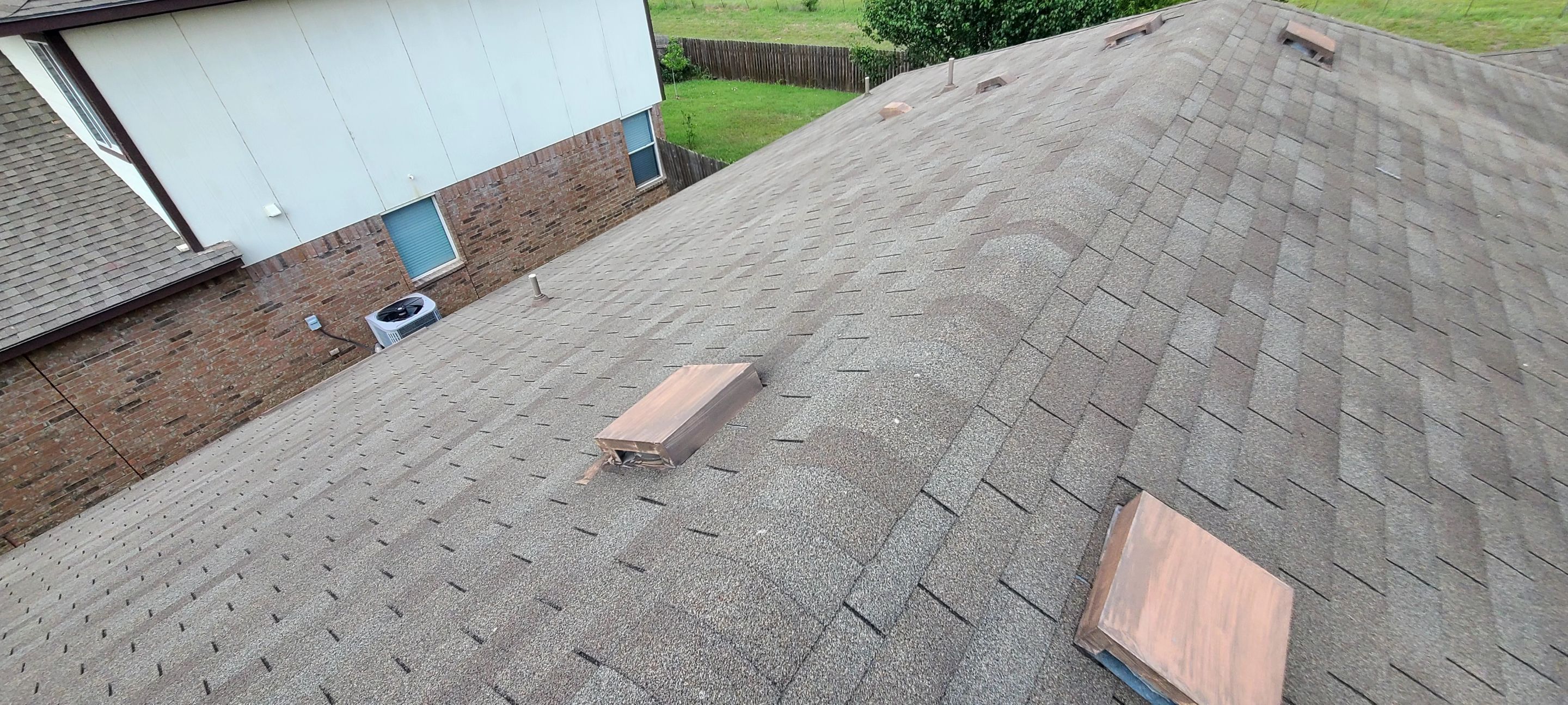 Asphalt Shingle Roof Replacement and Window Glazing in Manor by Caliber Restoration LLC
