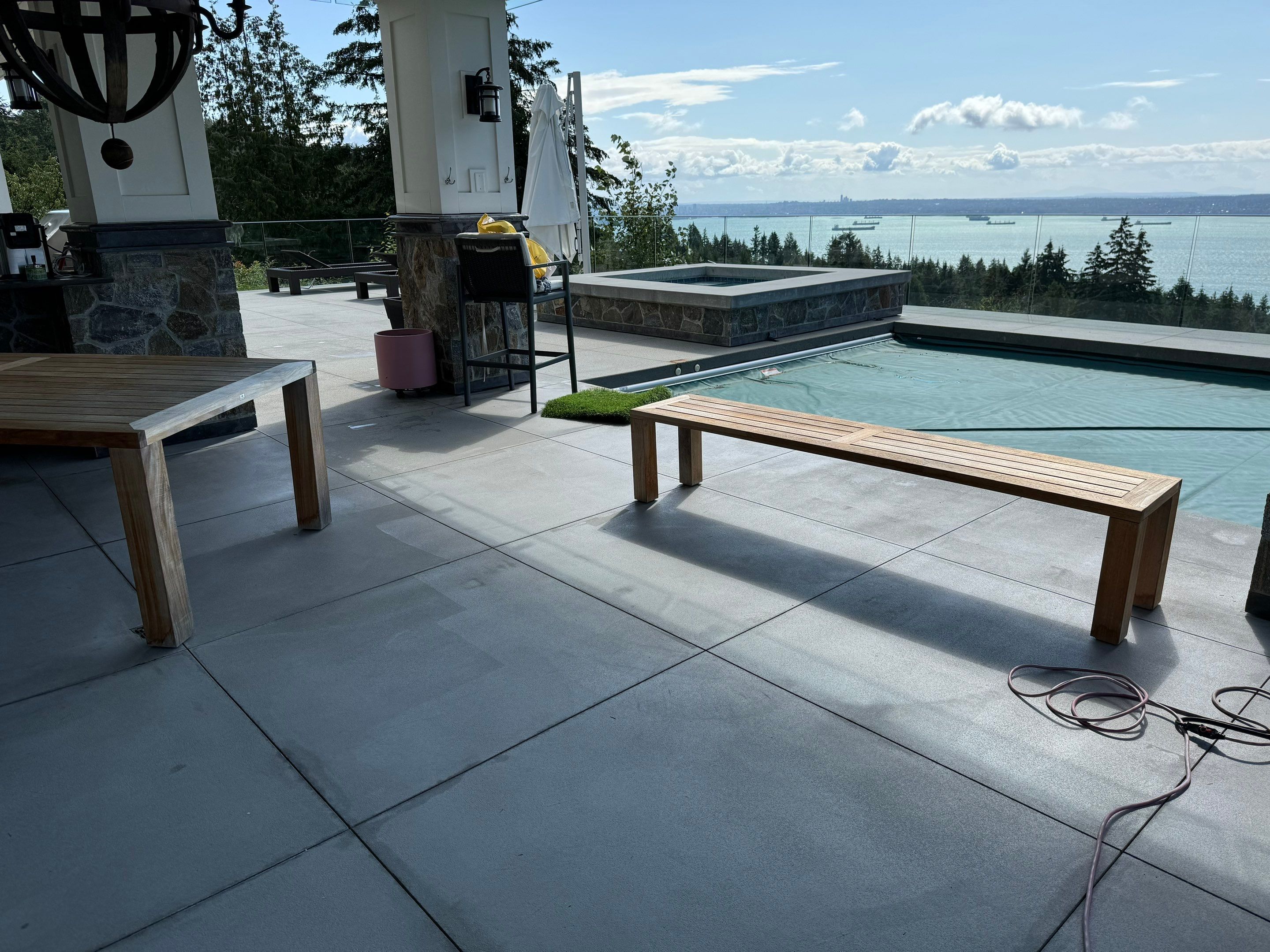 Applying Concrete Sealer  by YVR Construction Group