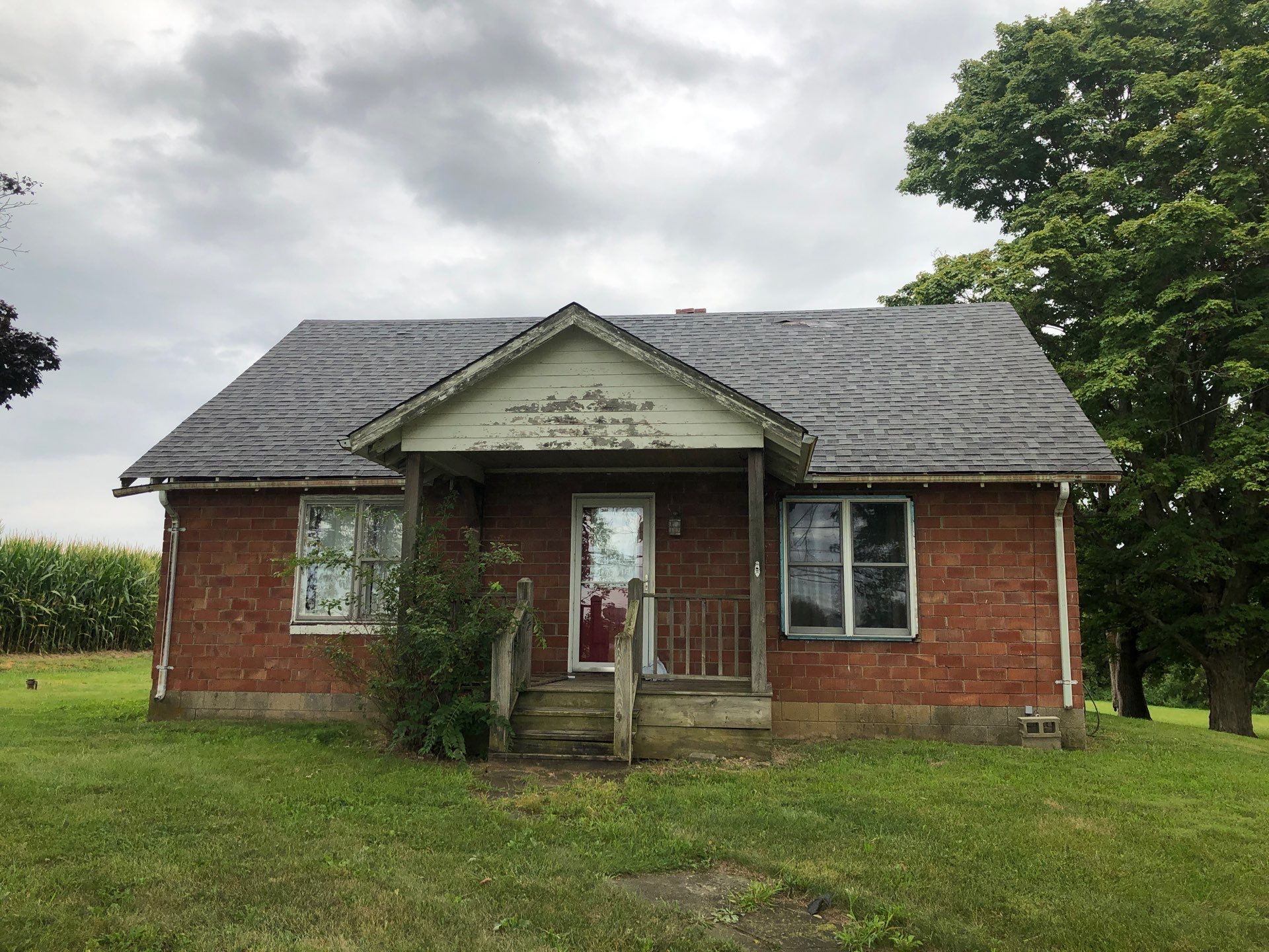 Old Farmhouse Restoration by 317 Roofing & Restorations