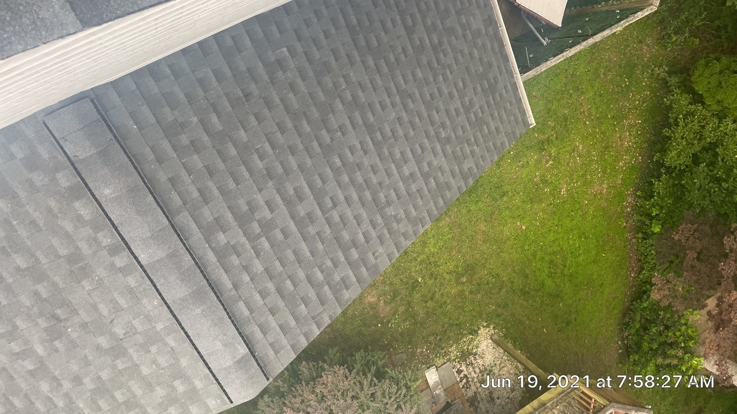Exterior Home Makeover using GAF Timberline HDZ, GAF Decotech, and James Hardie Siding by American Home Contractors