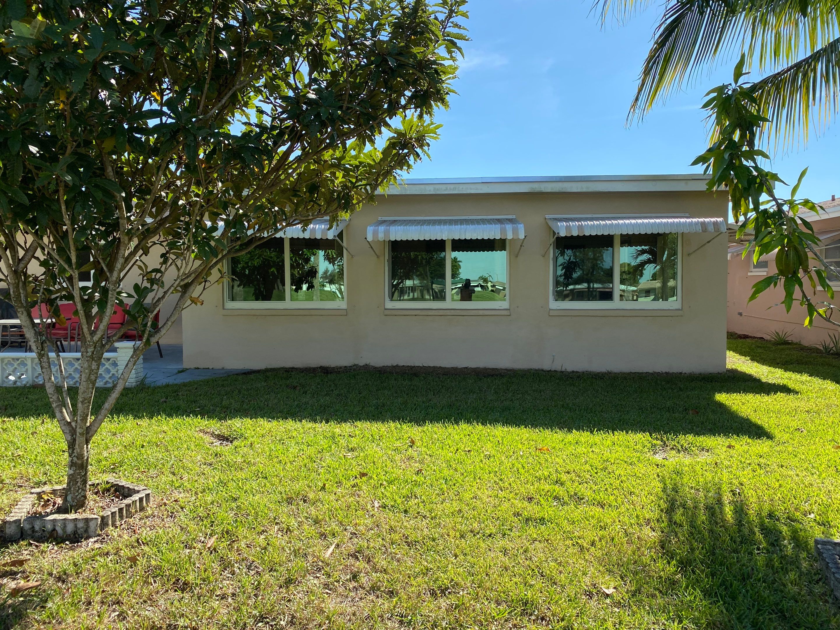 Tamarac Residential Entry Door and Aluminum Window Installation Project by The Door Doctor of South Florida, Inc.