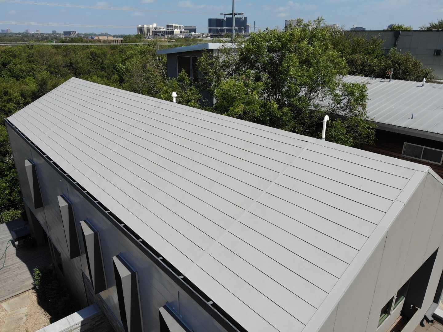 Metal Roofing project using MBCI Flexloc Panels - 22 gauge - silver metallic-in-color by Becker Roofing and Exteriors