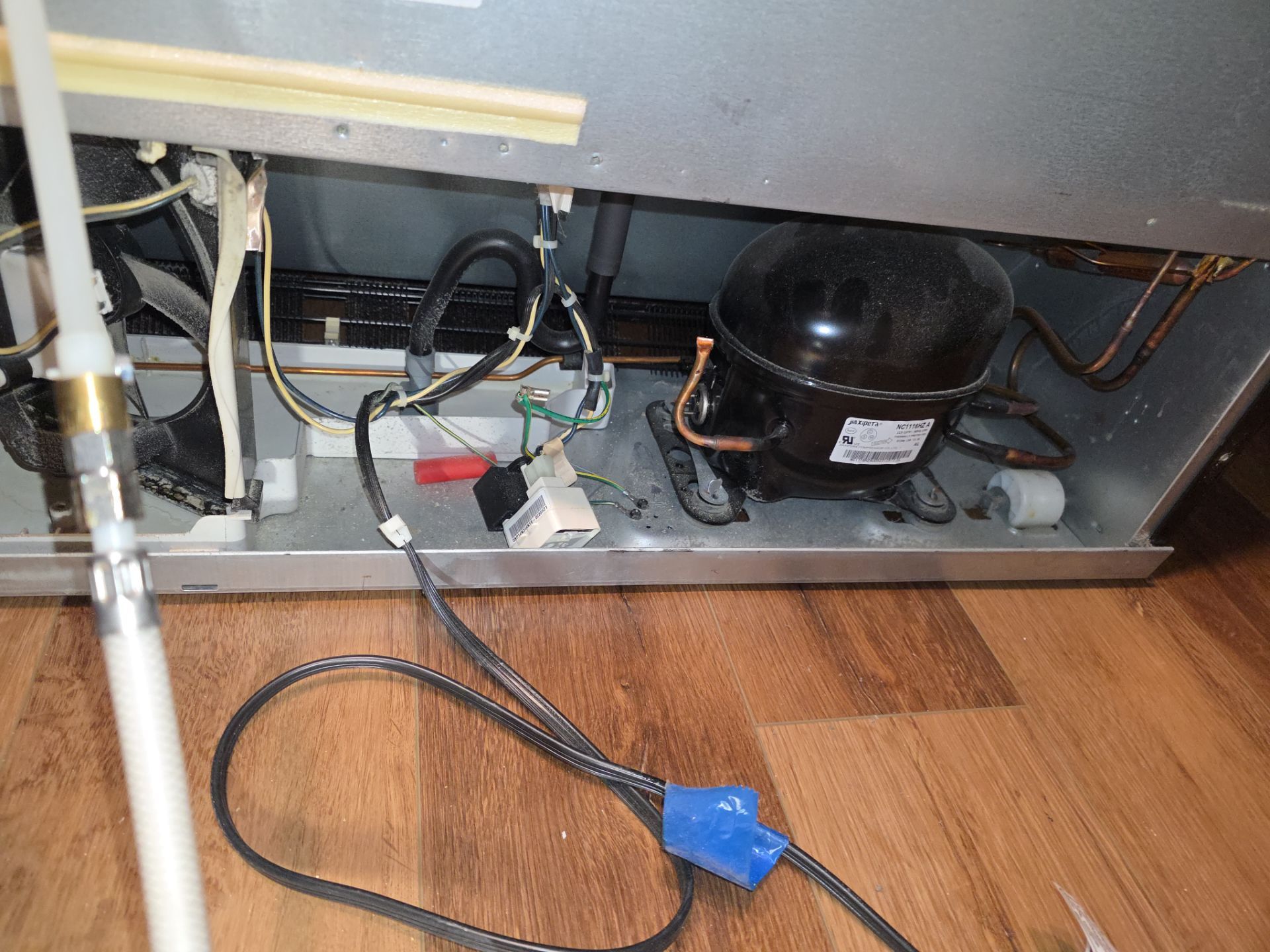 Whirlpool French Door Refrigerator Sealed System Repair in Leesburg by AMB-WORKS APPLIANCE REPAIR