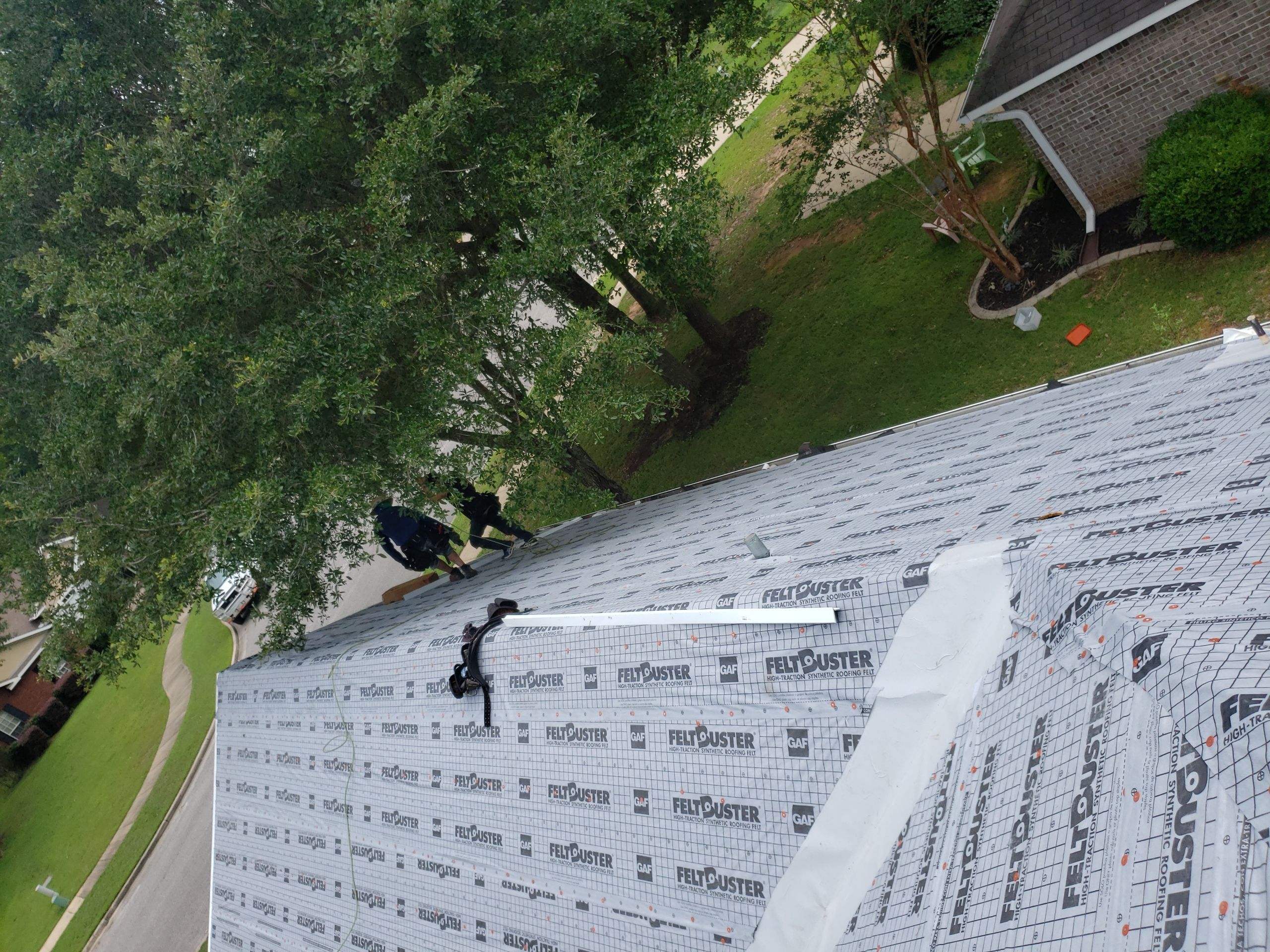 Residential Roofing Installation using Roof Replacement by American Roofing & Construction LLC