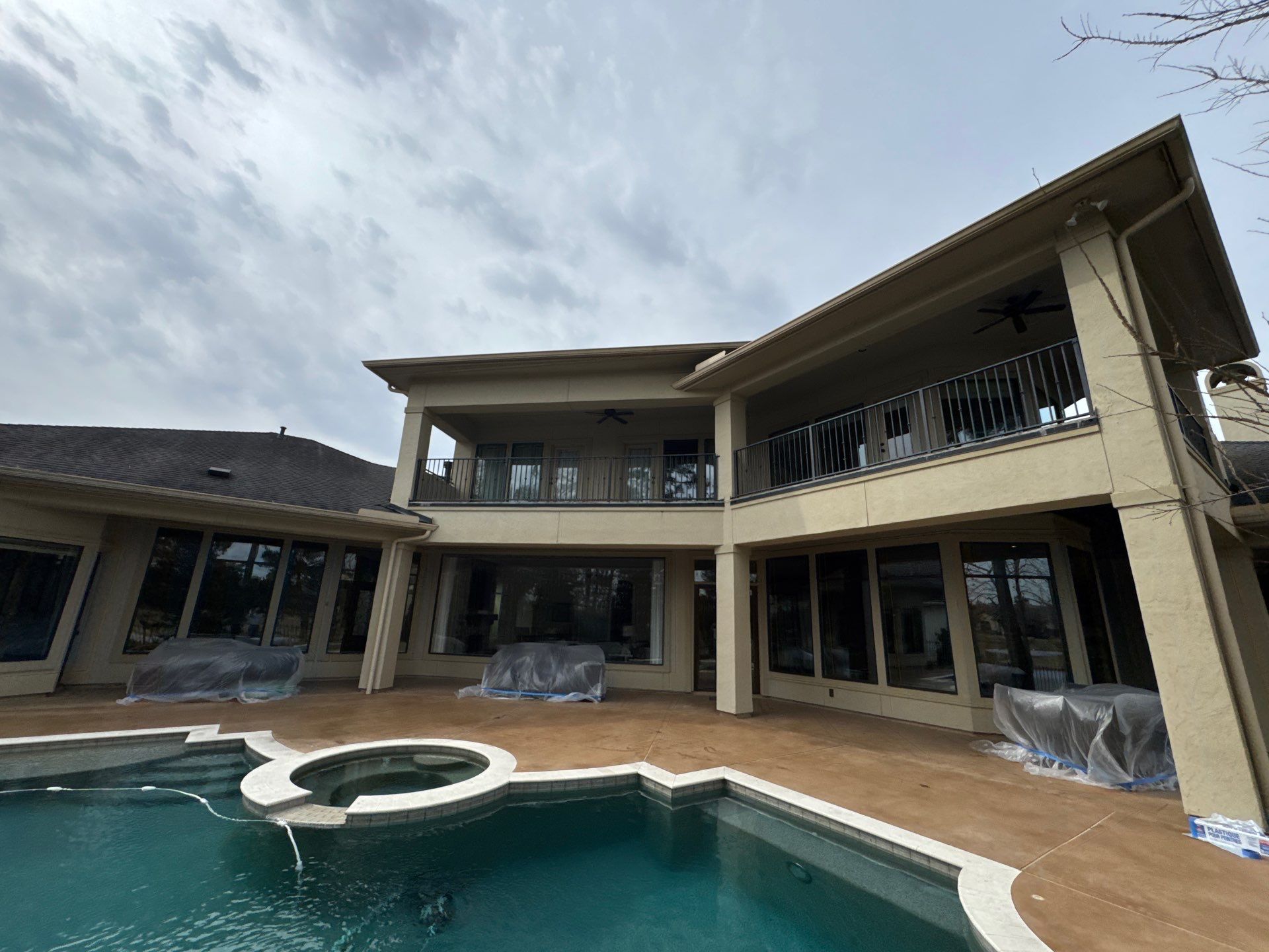 Complete Exterior Painting and Stucco Refinishing in Spring by Rolling Nations