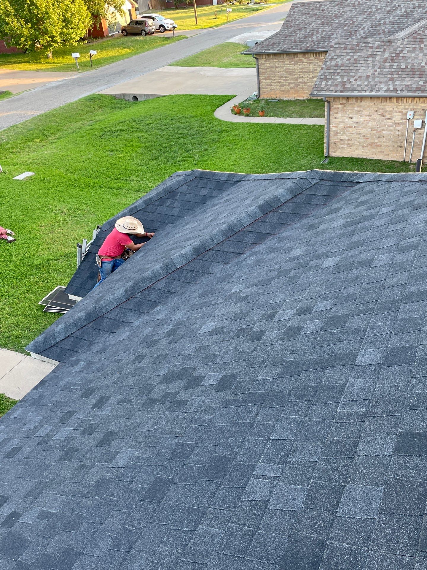 Residential Roofing Installation using ATLAS Pinnacle Pristine Shingles by Harvey Roofing & Construction