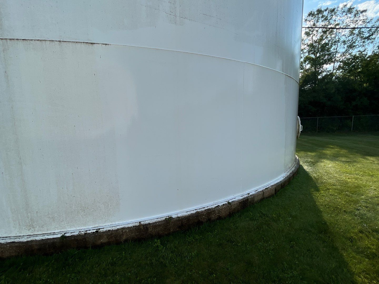 Water tank cleaning by Northern Power Washing LLC.