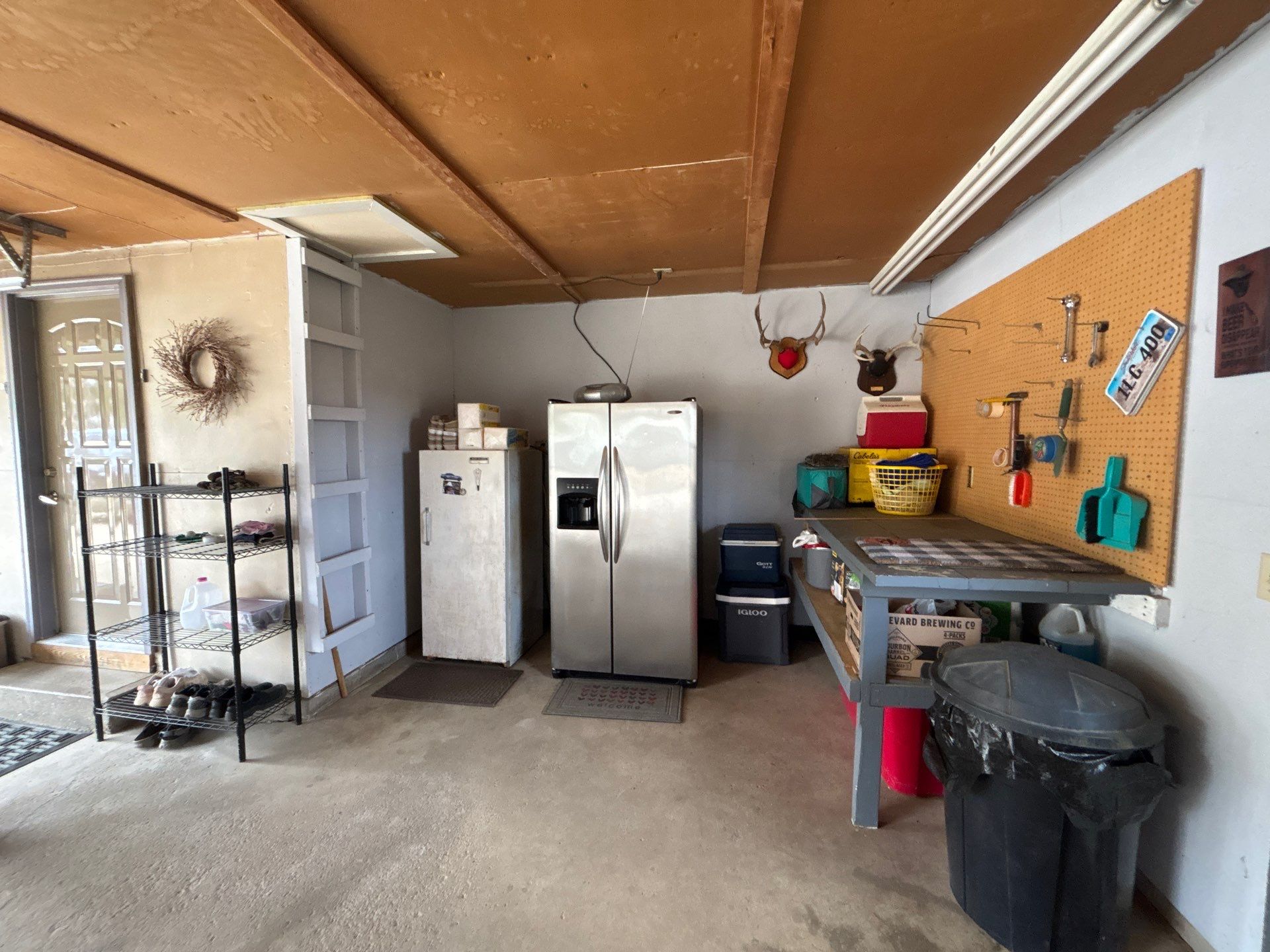 Full-Flake Epoxy Garage Floor Coating Installation in Sioux Falls by Select Painting, Coatings & Garage Cabinets