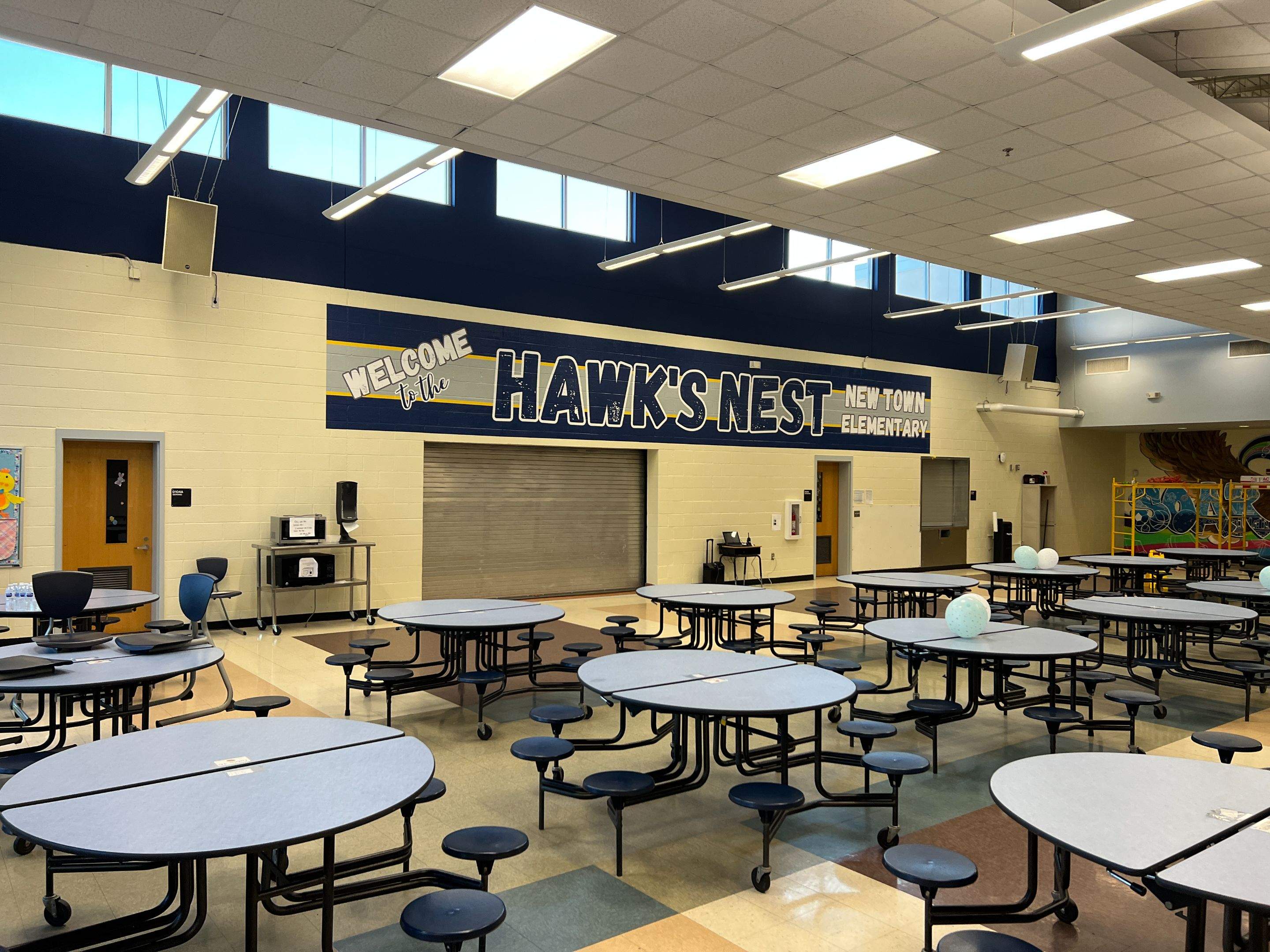 New Town Elementary School - Cafeteria Wall Graphic by QC Signs and Graphics