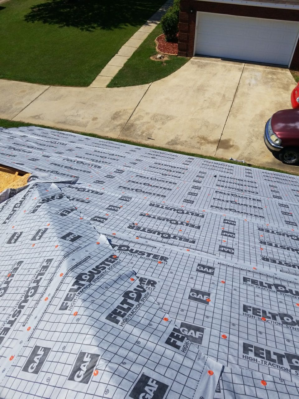 Residential Roofing Installation using Roof Replacement by American Roofing & Construction LLC