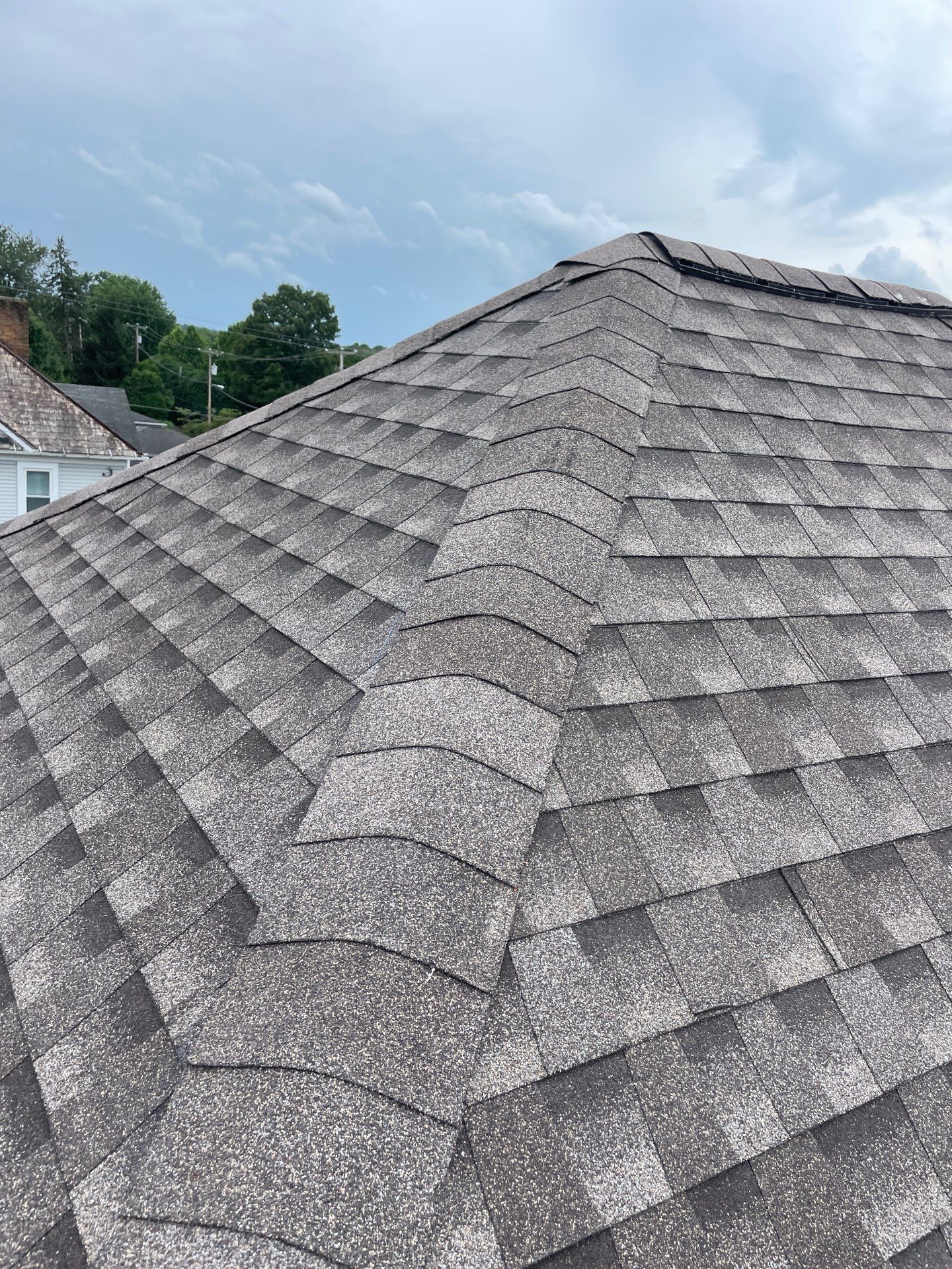 Residential Roofing Installation using GAF Timberline HDZ Charcoal by Rainstoppers Roofing