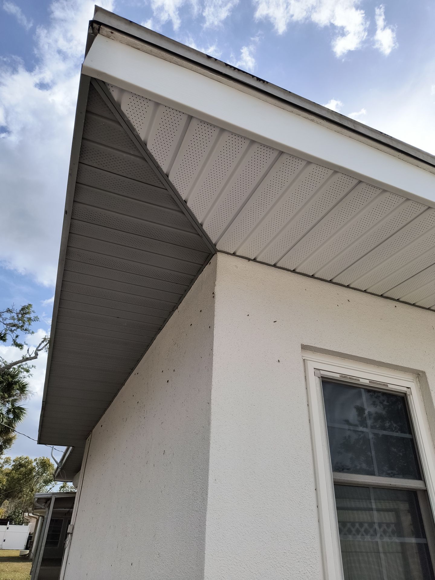 Soffit and Fascia Installation using White Soffit in Sarasota Fl by Gutter Professors