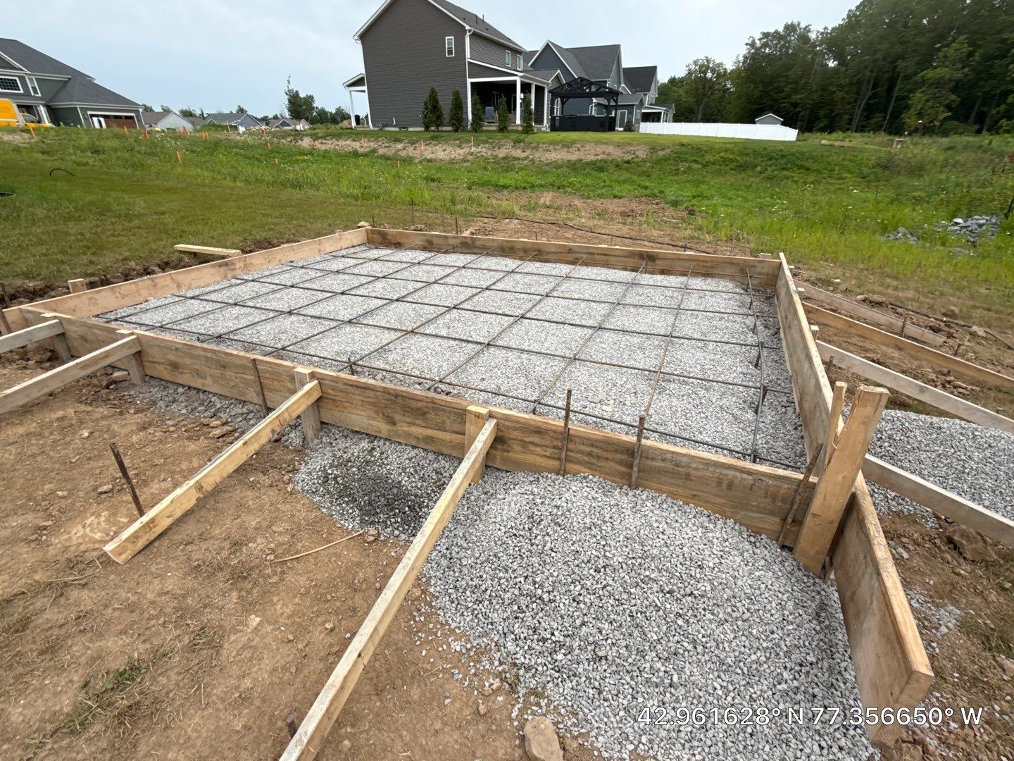 Oxford Slate Patio with Fire Pit by NG Masonry & Construction LLC