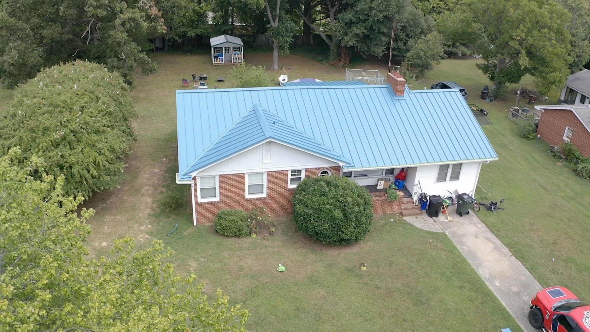 Carolina Blue Standing Seam Roof by Just In Time Roofing and Restoration