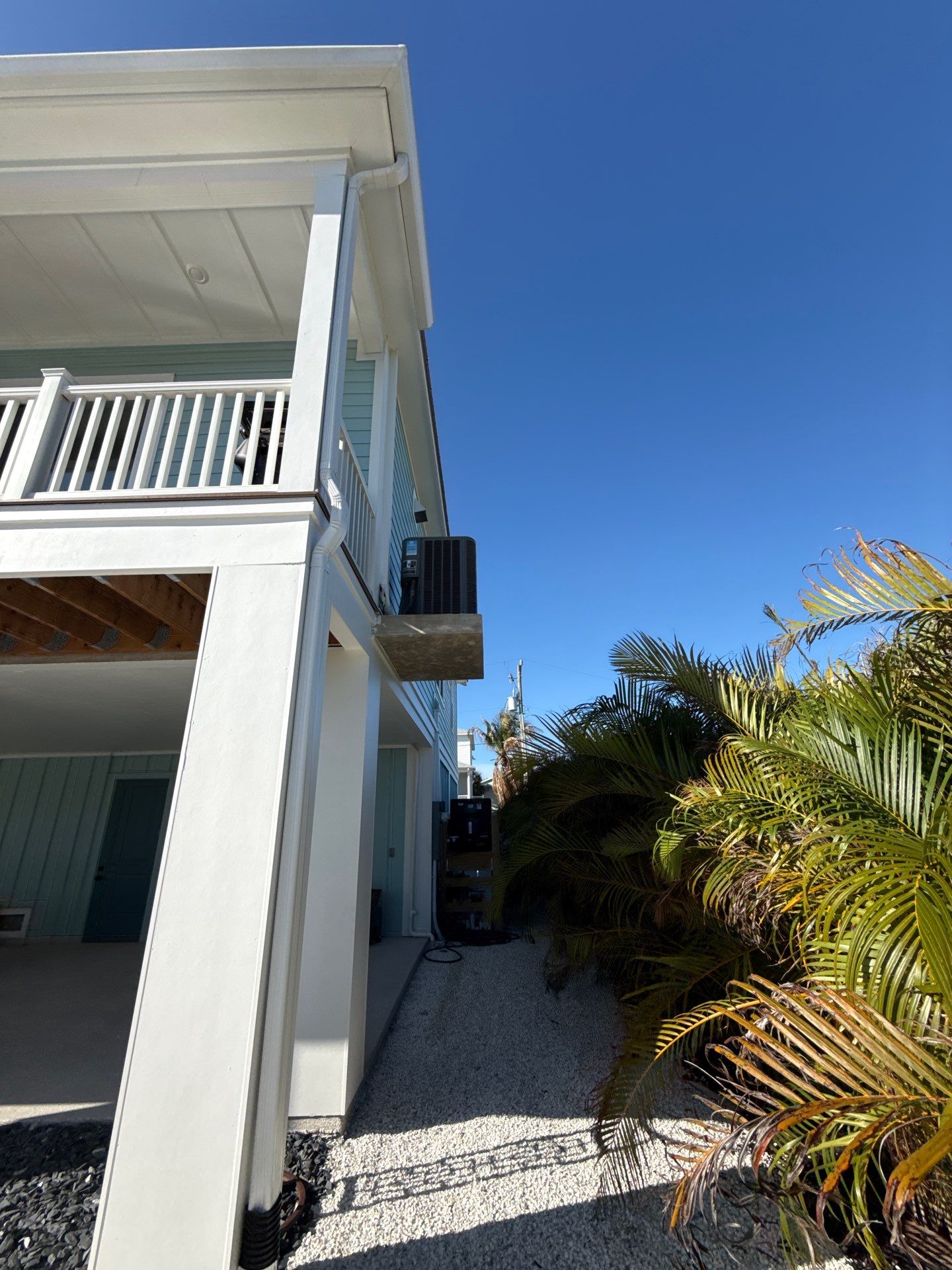 New White Seamless Gutters Installation and Downspouts, Reseal Gutters in Fort Myers Beach, FL  by Gutter Professors