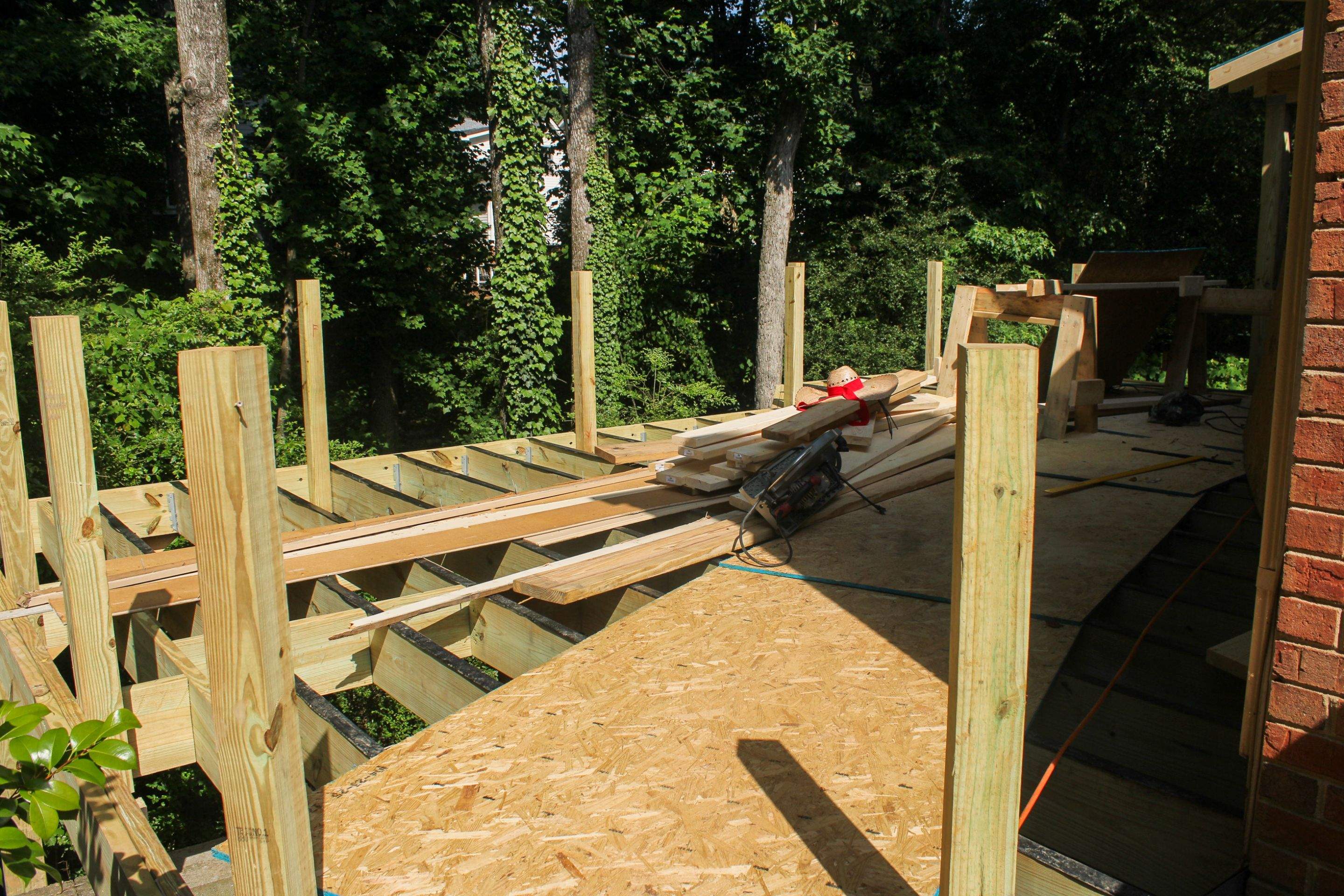 Deckorators Voyage Deck and Shed Style Covered Porch Build with Drink Rail by Nelson Exteriors 