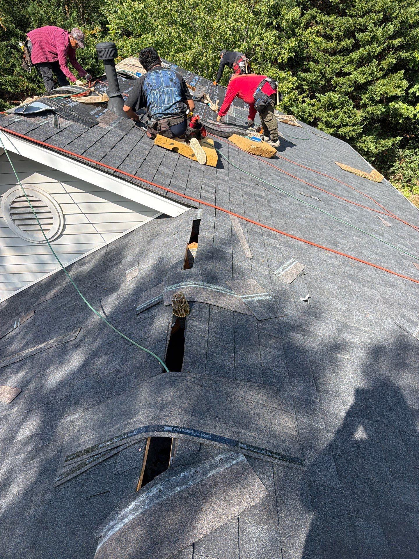 Roof and gutter replacement by hail and wind damage by Just Brilliant Restoration JBR