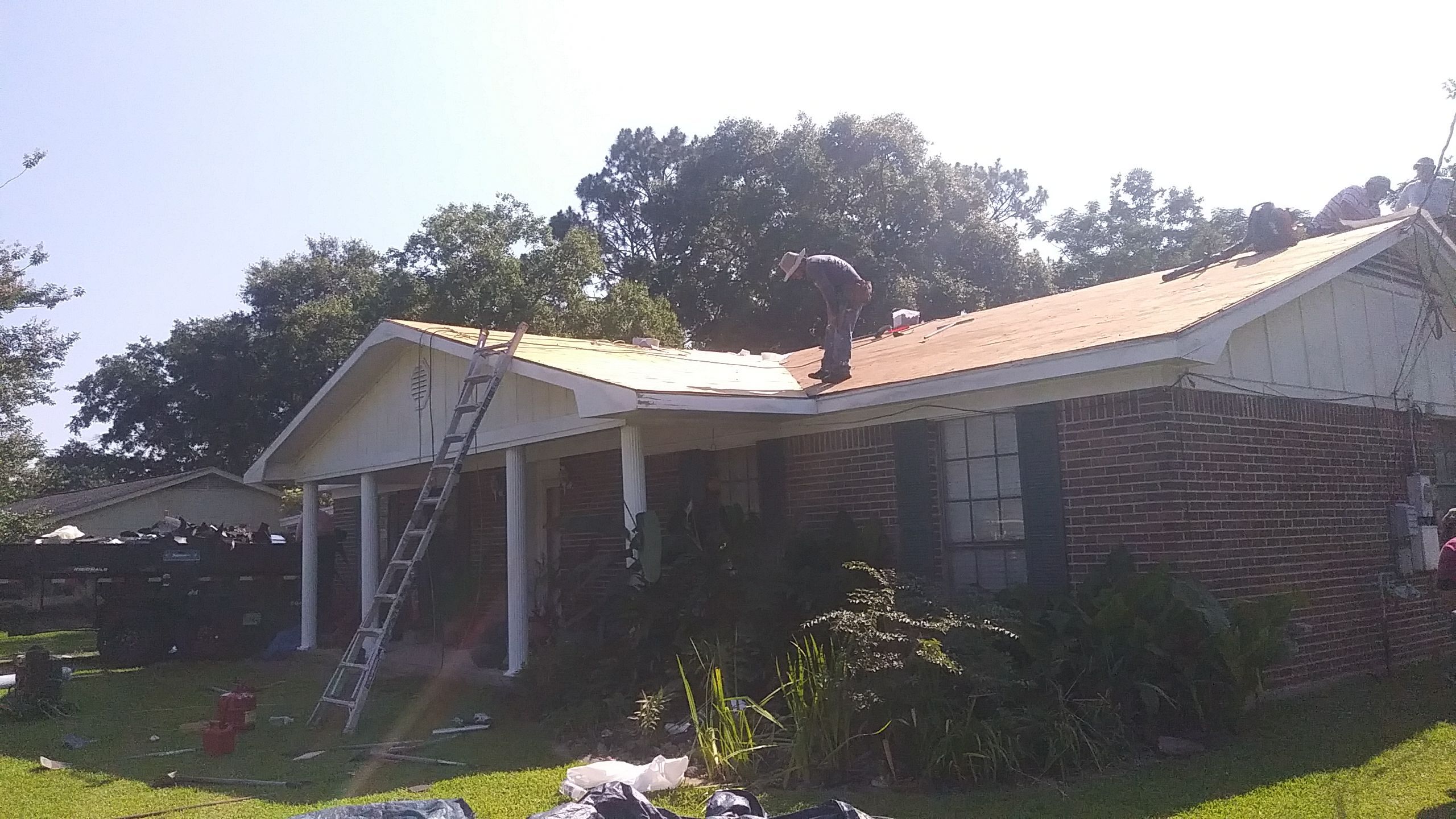 Residential Roofing Installation using Roof Replacement by American Roofing & Construction LLC