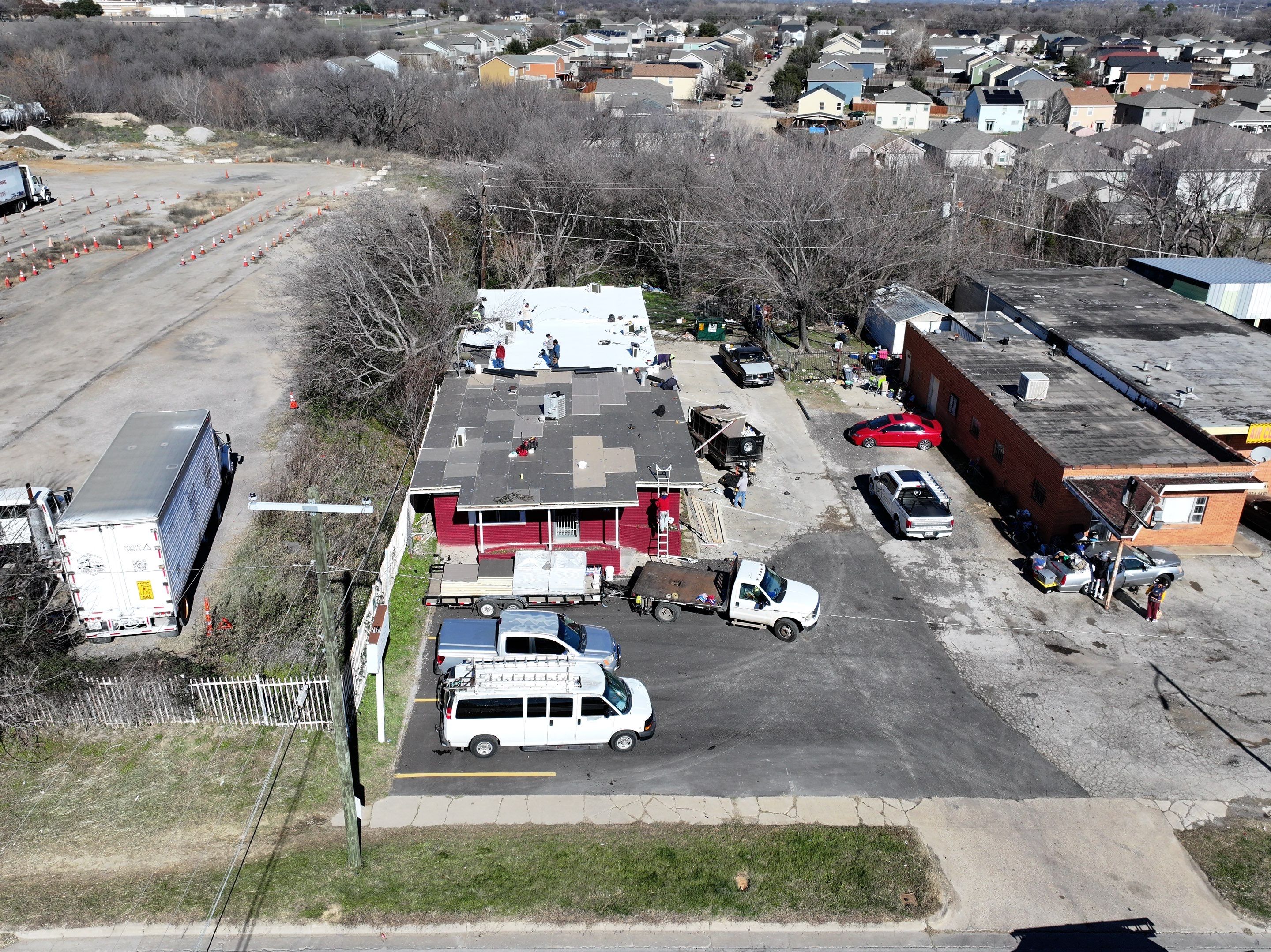 Commercial roofing overlay using GAF TPO over an old ballast roof by Becker Roofing and Exteriors