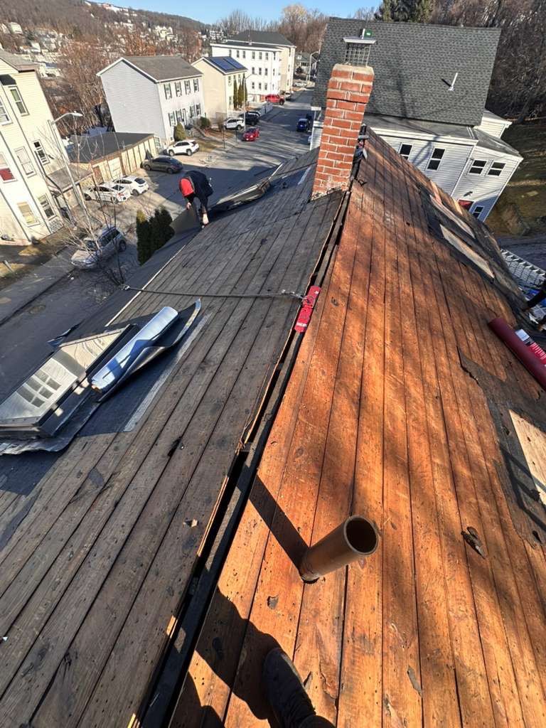 Full Roof Replacement with Skylight Removal for Winter Protection by Sensible Home Solutions