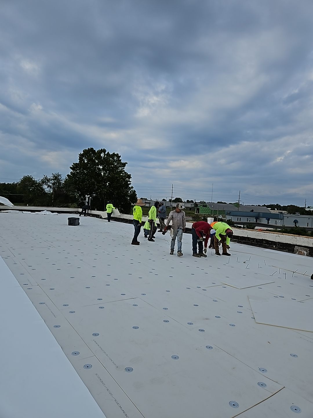 Commercial Flat Roofing Install  by Titan Commercial & Residential Roofing 