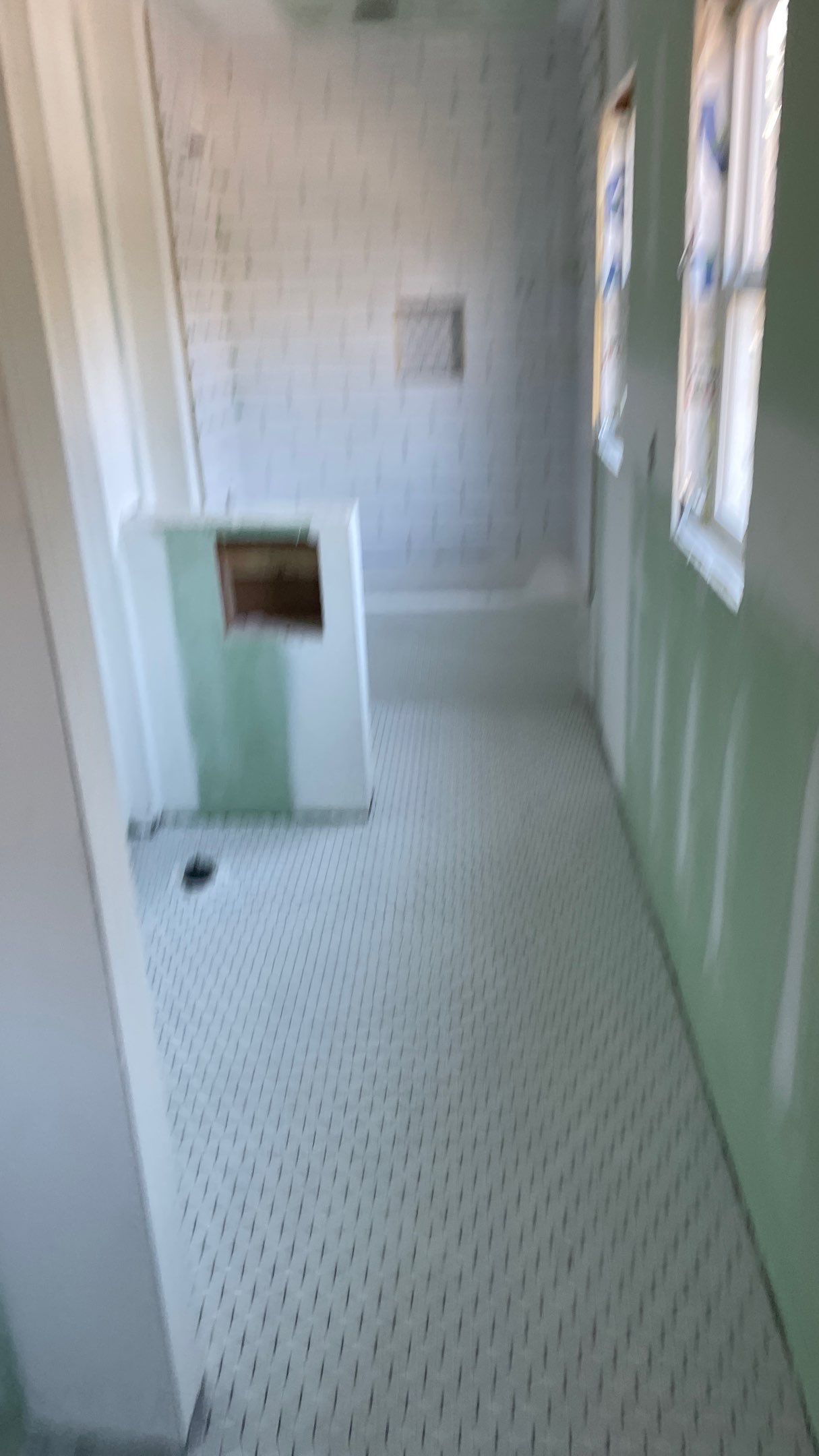 Remodeled Home with new tile floors, Showers and Refinished Oak Floors with stain and Waterbased Finish by Footprints Floors of Coastal Carolina