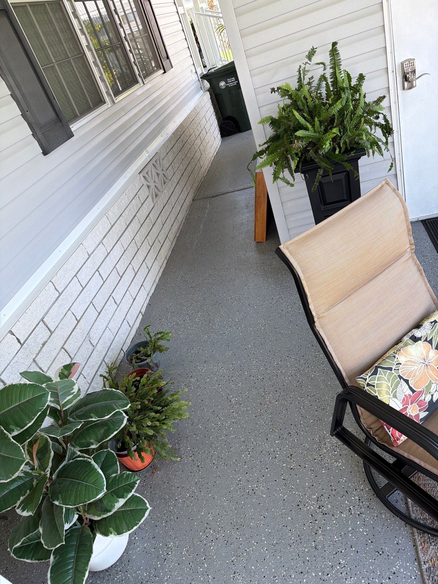Driveway Transformation with Gravel Grey Flake Epoxy Coating by Performance Floors & Coating