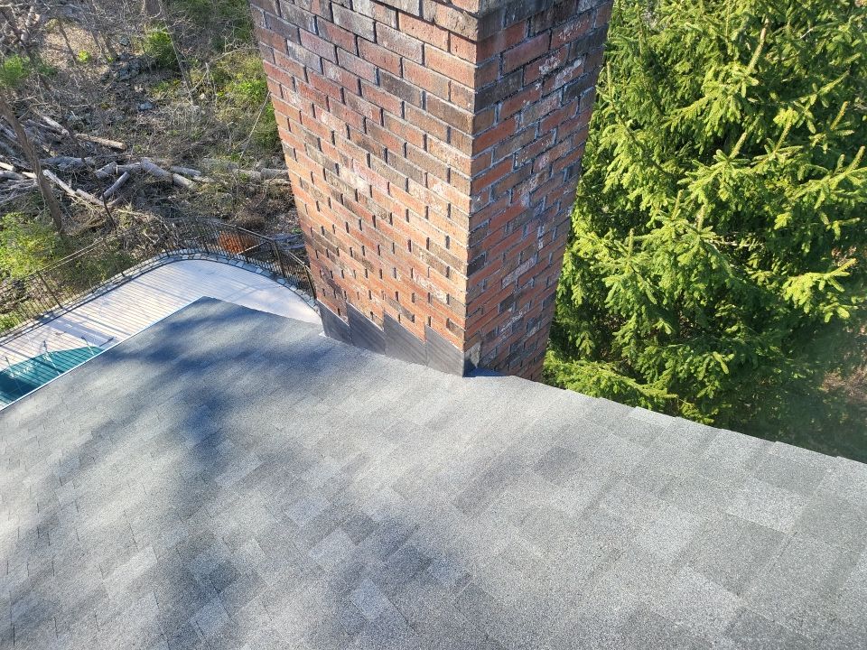 Residential Roofing Installation using onyx black by A Plus Exterior