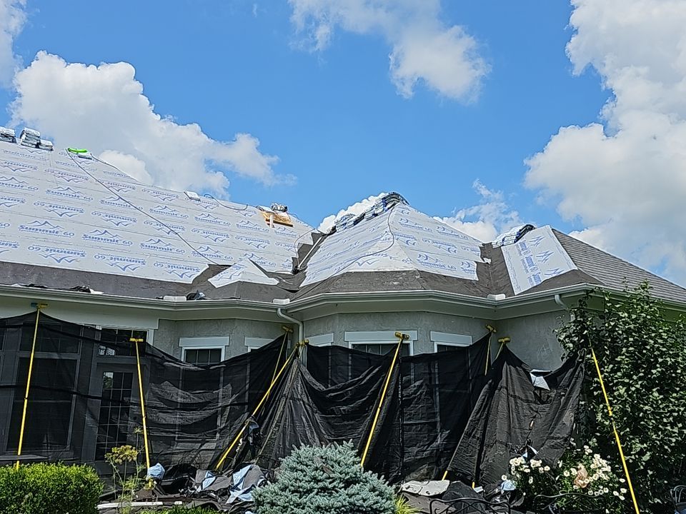 Residential Roofing Installation using Atlas Pinnacle Black Shingles by 614 Exteriors