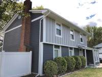 Siding Installation using JH Batten Smooth and JH Select Cedarmill Eased Edge by ExteriorPros