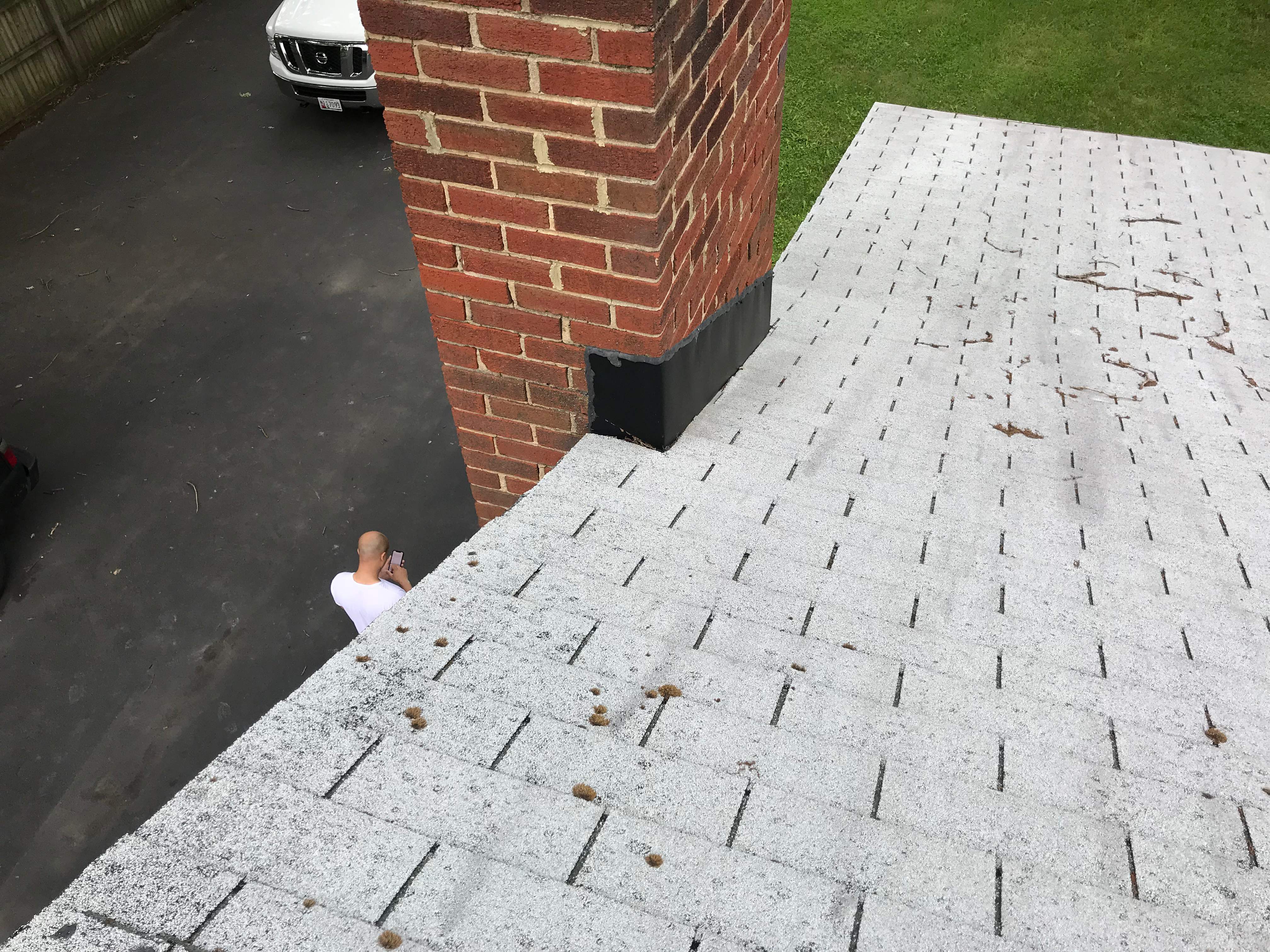 Residential Roofing Installation using Charcoal Black by Alpha Design Services