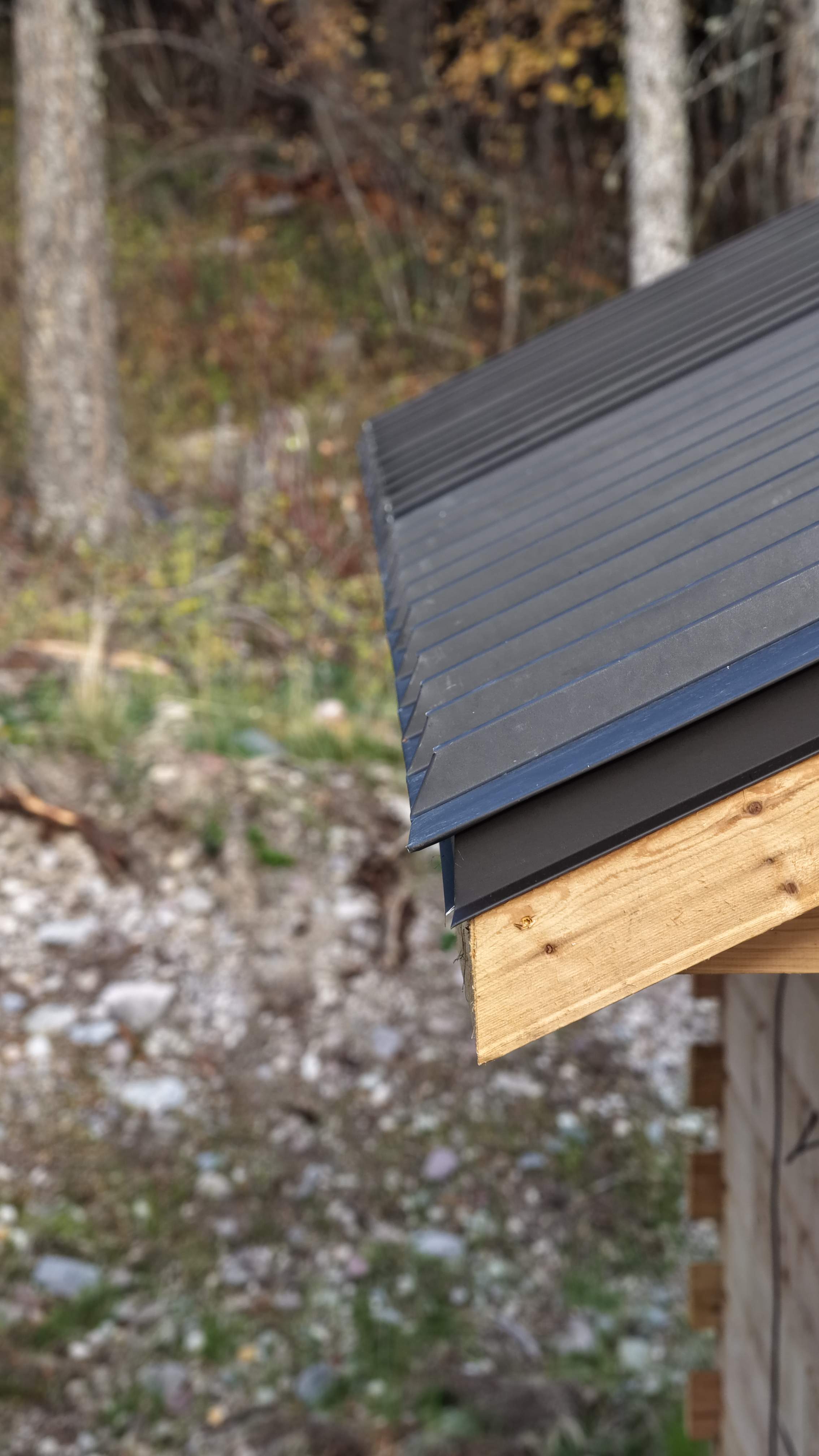 Mechanical Lock Standing Seam - CMG ULG Dark Bronze  by Montana Roofing Solutions