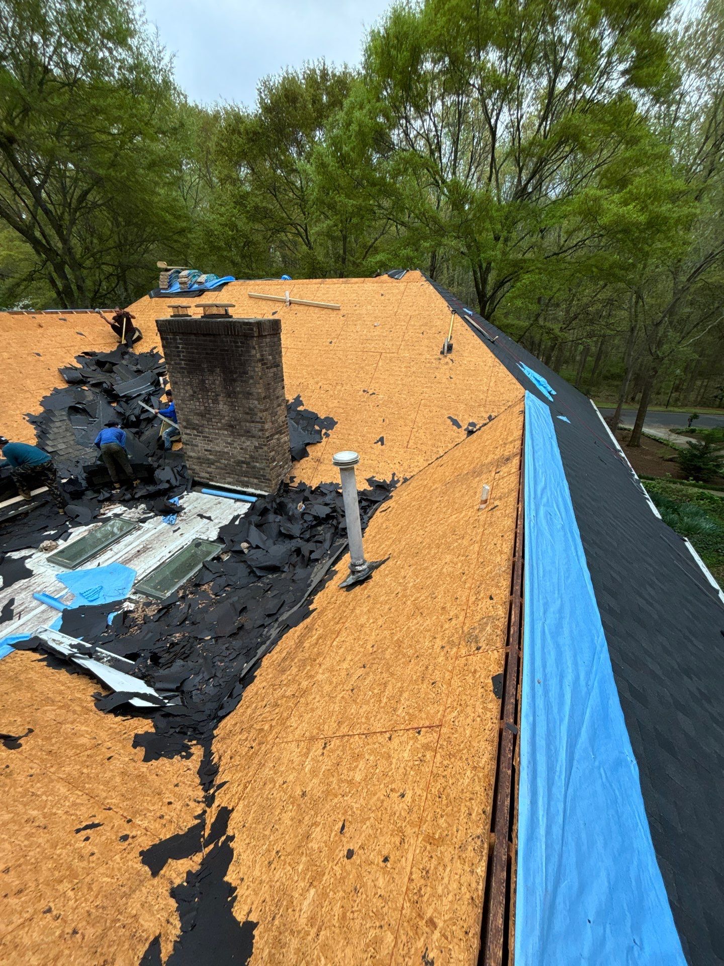 Spartanburg Residential Roof Replacement with Architectural Shingles and Skylights by Roofers LLC
