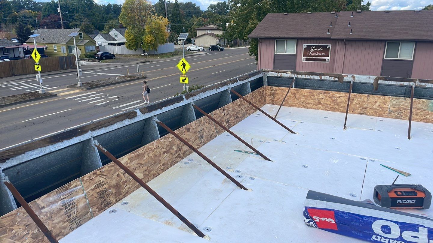 Commercial Roofing Installation using GAF 60Mil TPO  by Orezona Building & Roofing Company, Inc.