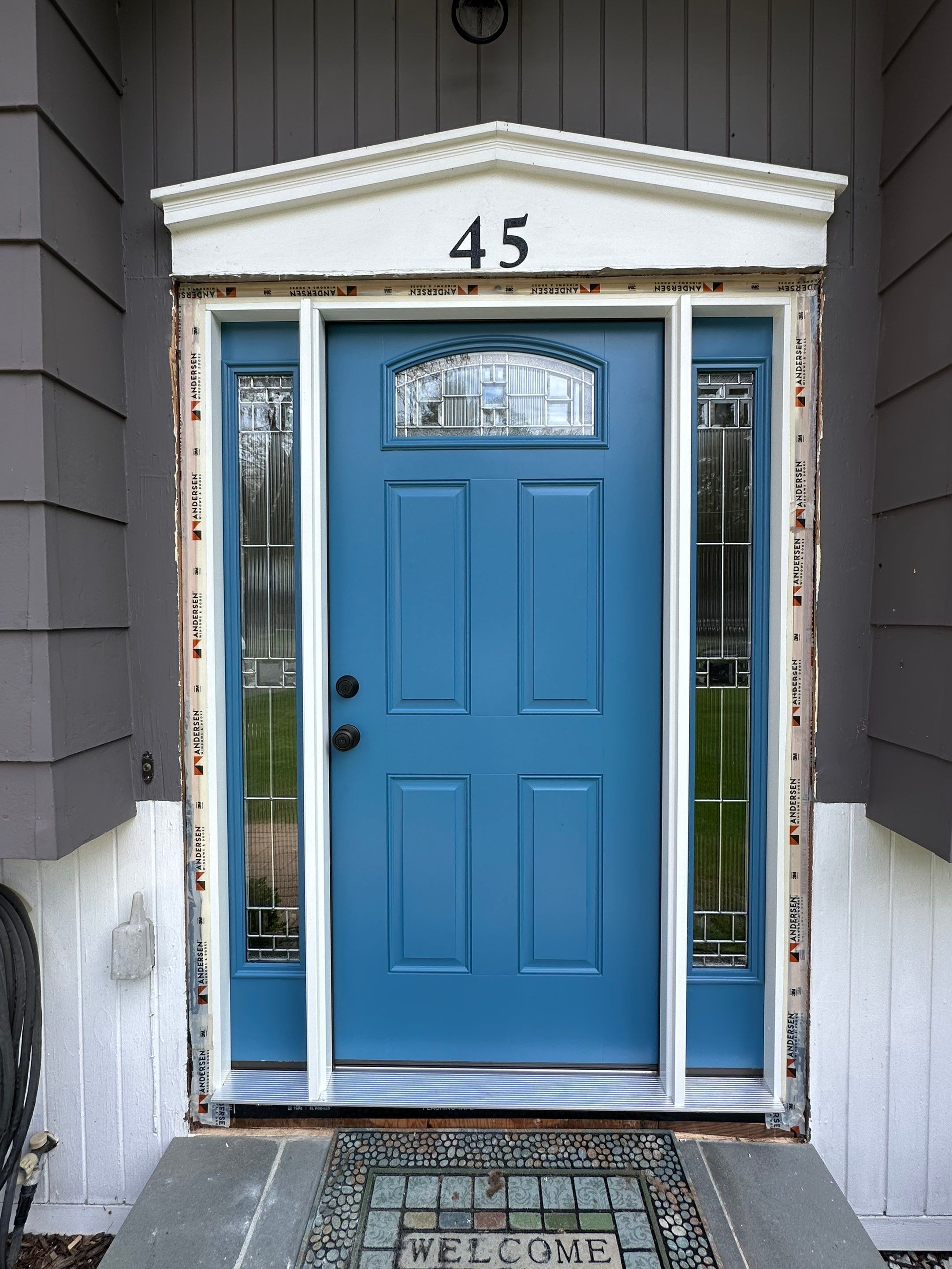 Siding and door replacement in Holliston, MA by UBrothers Construction