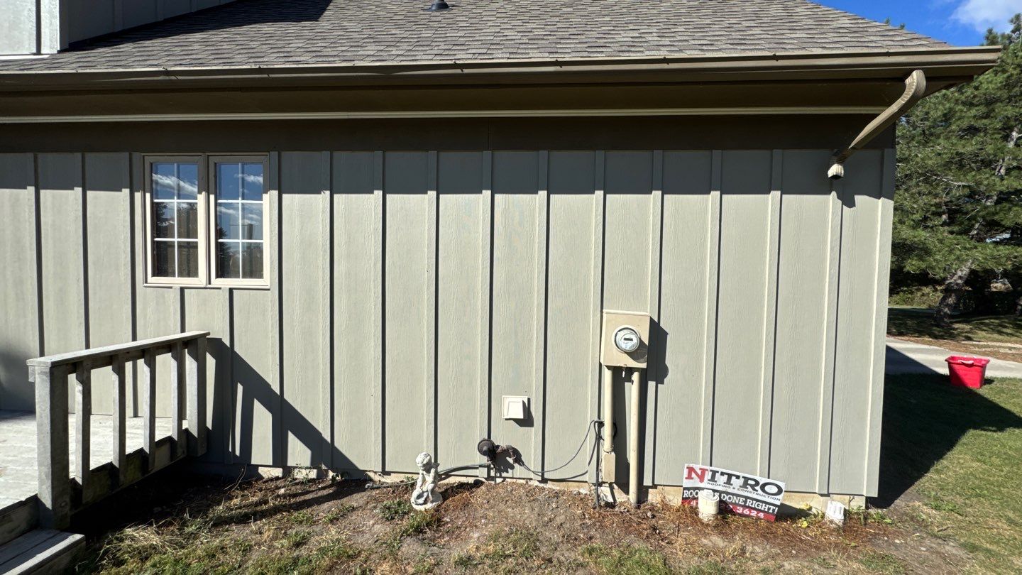 Siding Installation using Hardie Board and Batten Monterey Taupe by Nitro Roofing and Construction