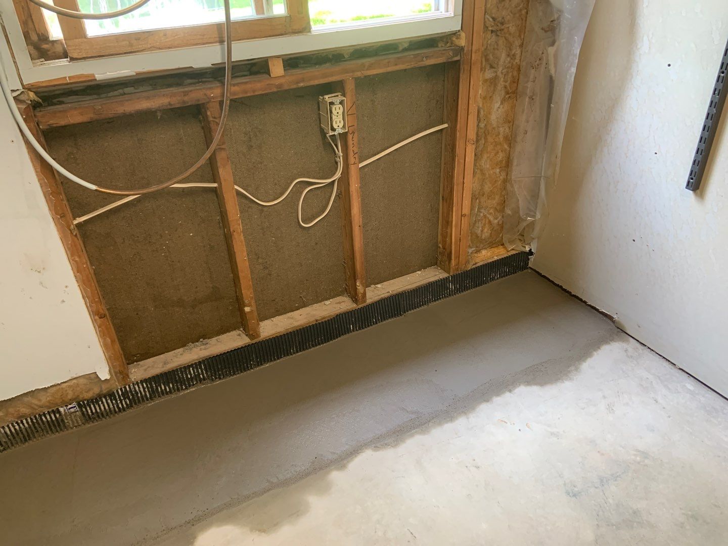 Correcting an Improper Installation for Alan in Chanhassen by Waterproofing Northeast
