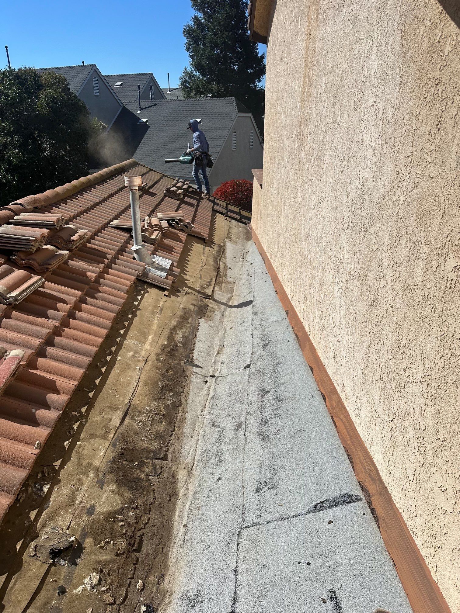 Tile Roof repair by Grandmark Service Company