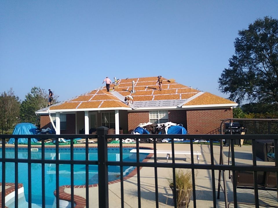 Residential Roofing Installation using Roof Replacement by American Roofing & Construction LLC