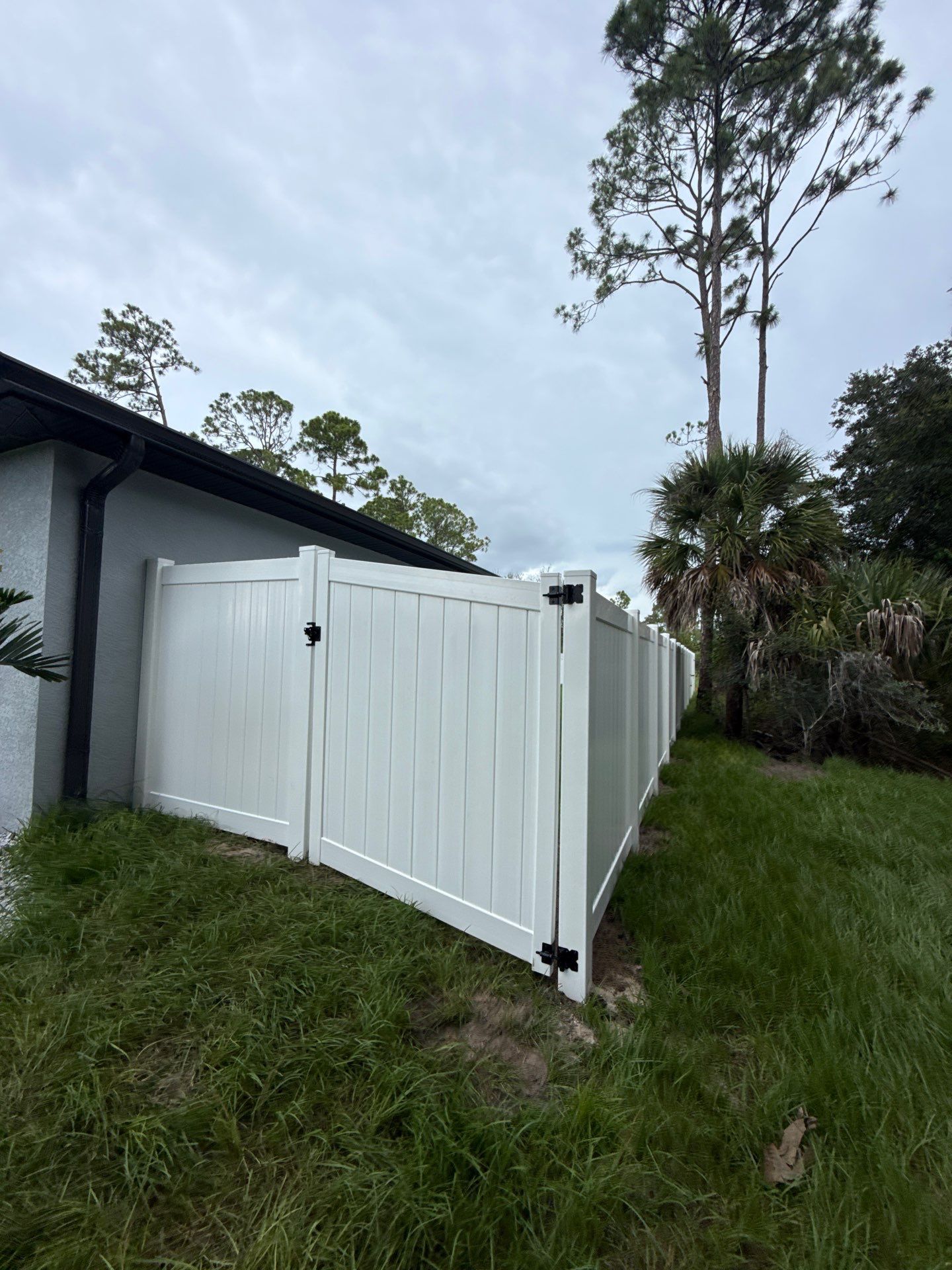 White Vinyl Privacy Fence Installation in North Port by True Fence LLC