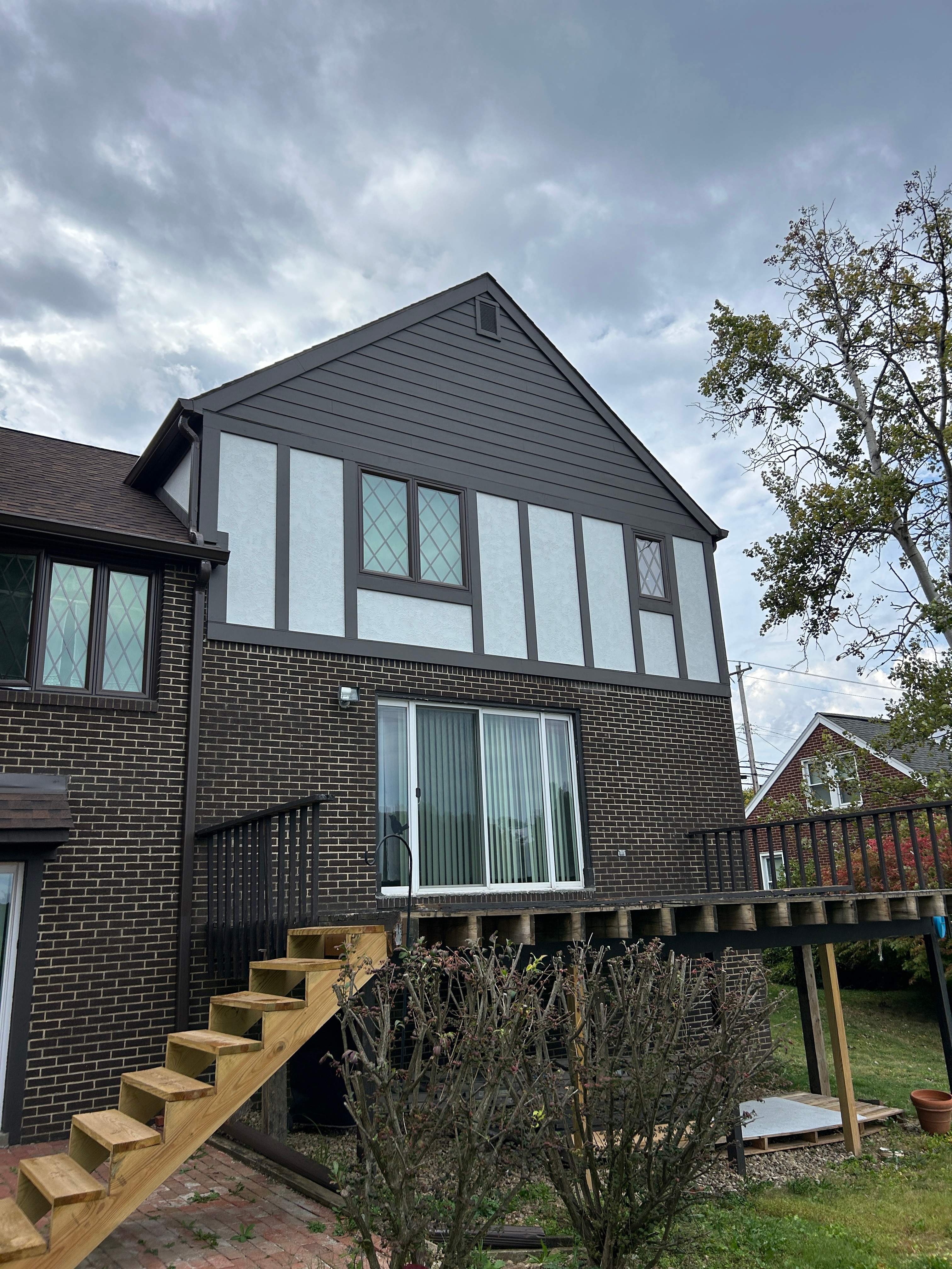 James Hardie Stucco Panel Tudor Remodel by Ideal Siding Pittsburgh