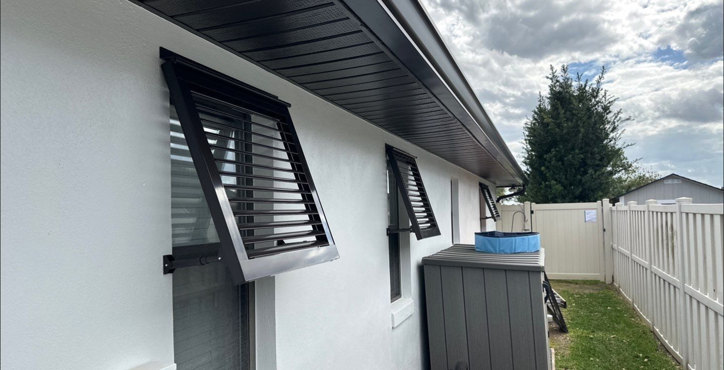 Bahama Shutters in Grey Brown by Smart Guard Shutters