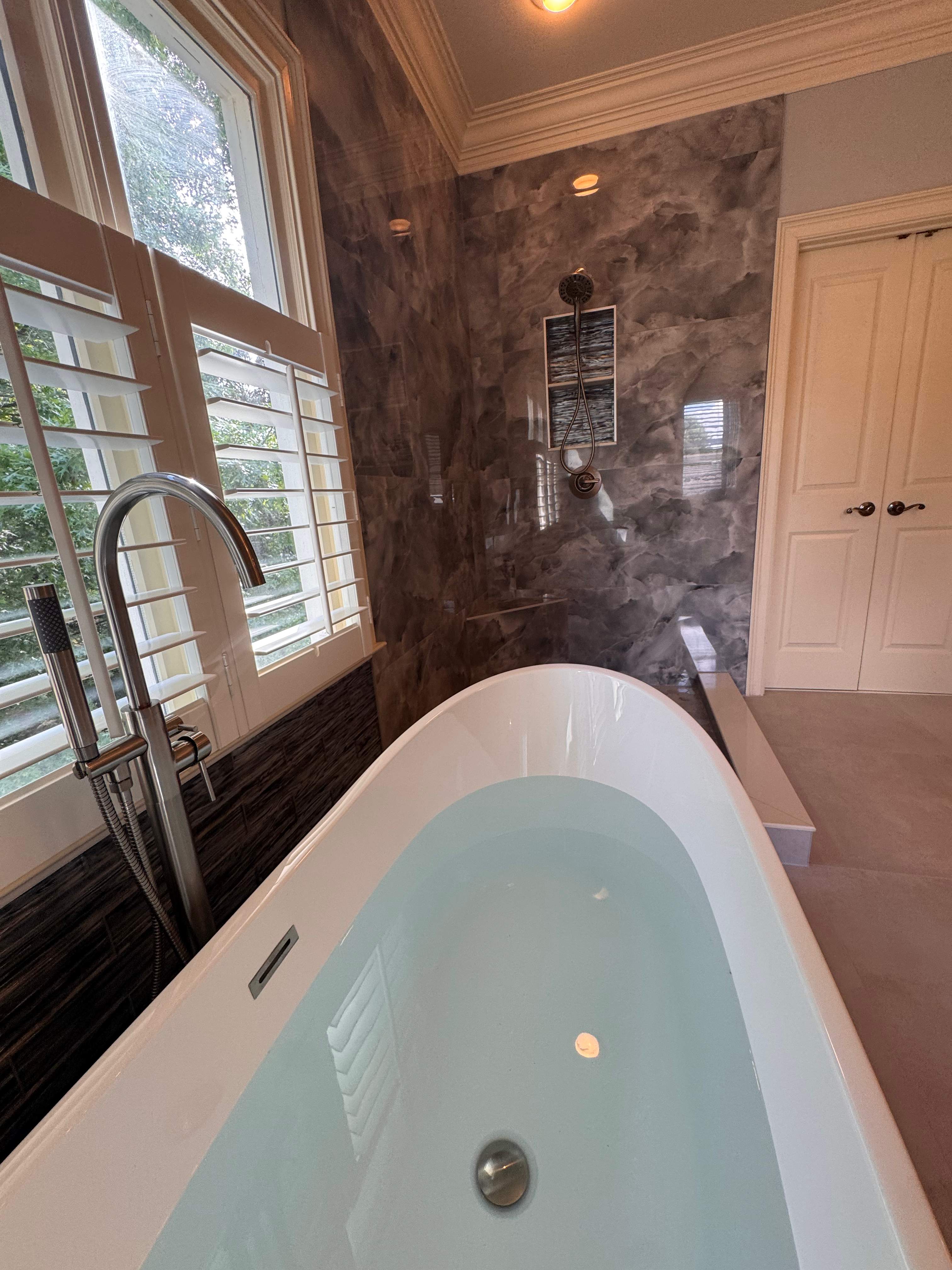 Master bathroom renovation using Free standing tub by Prudencio