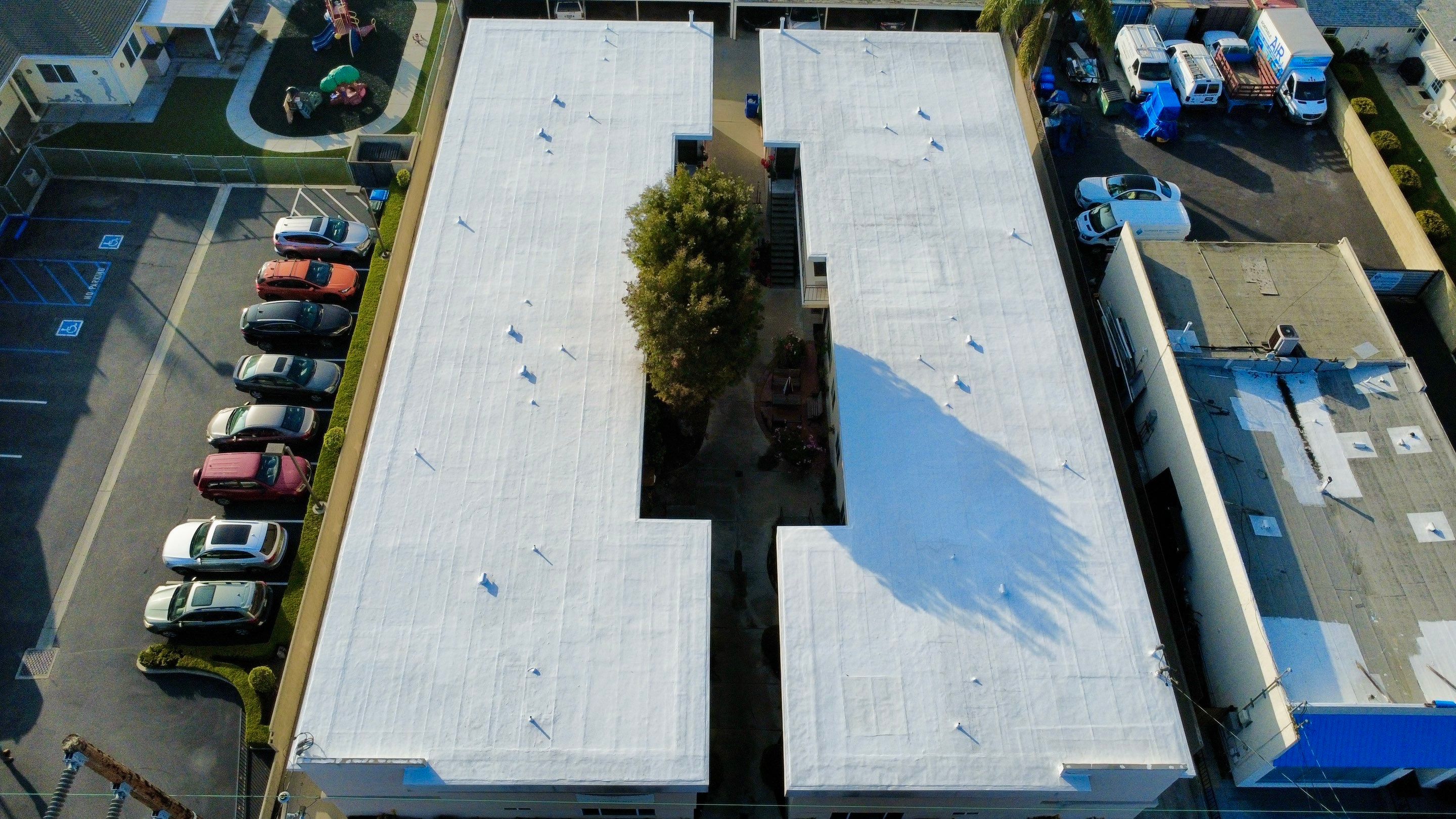 Silicone Membrane installation in LOMITA, CA. by Hull Brothers Roofing