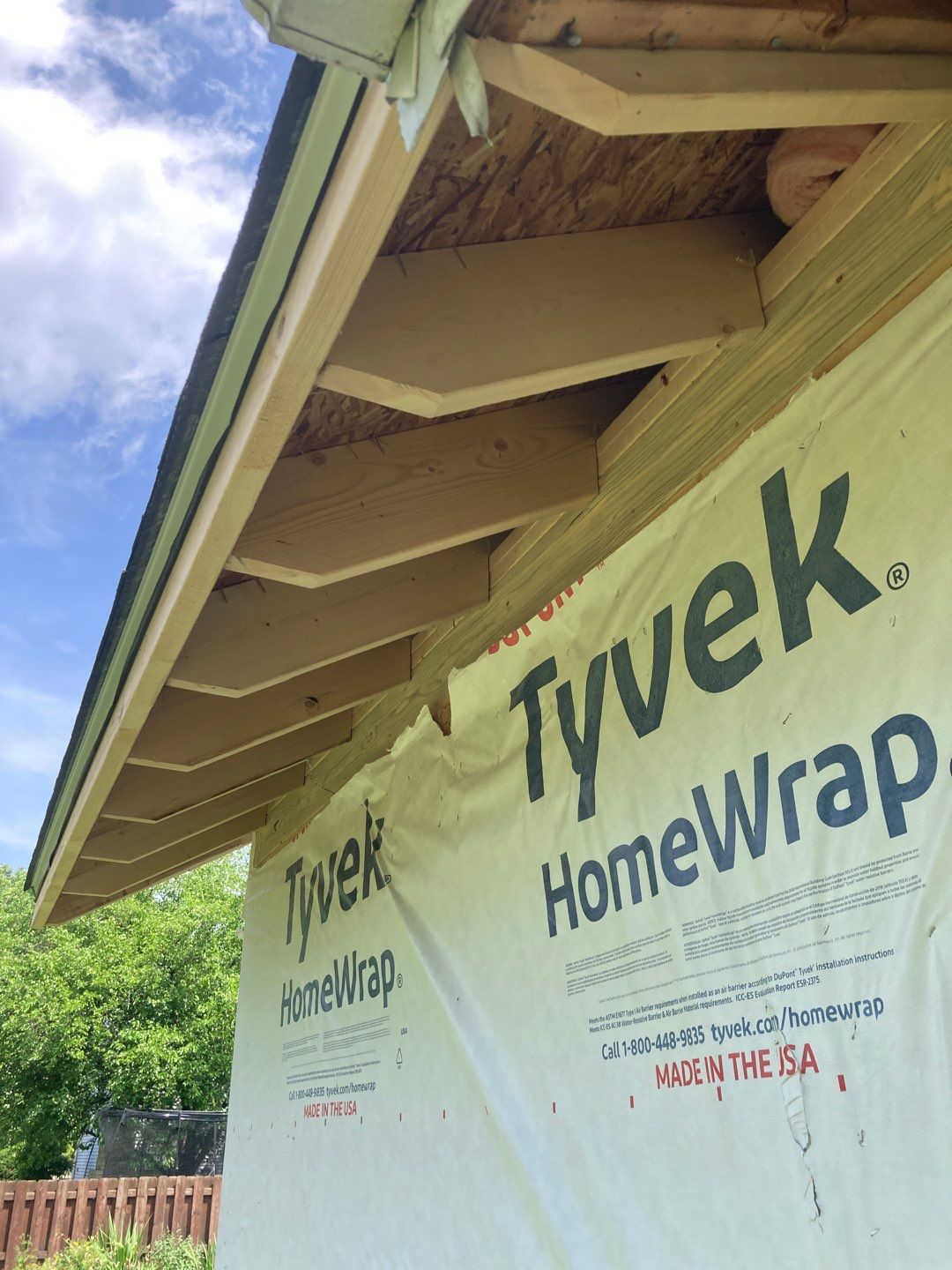 Gutter Installation using 5" Seamless Aluminum Gutters by Absolute Roofing and Construction