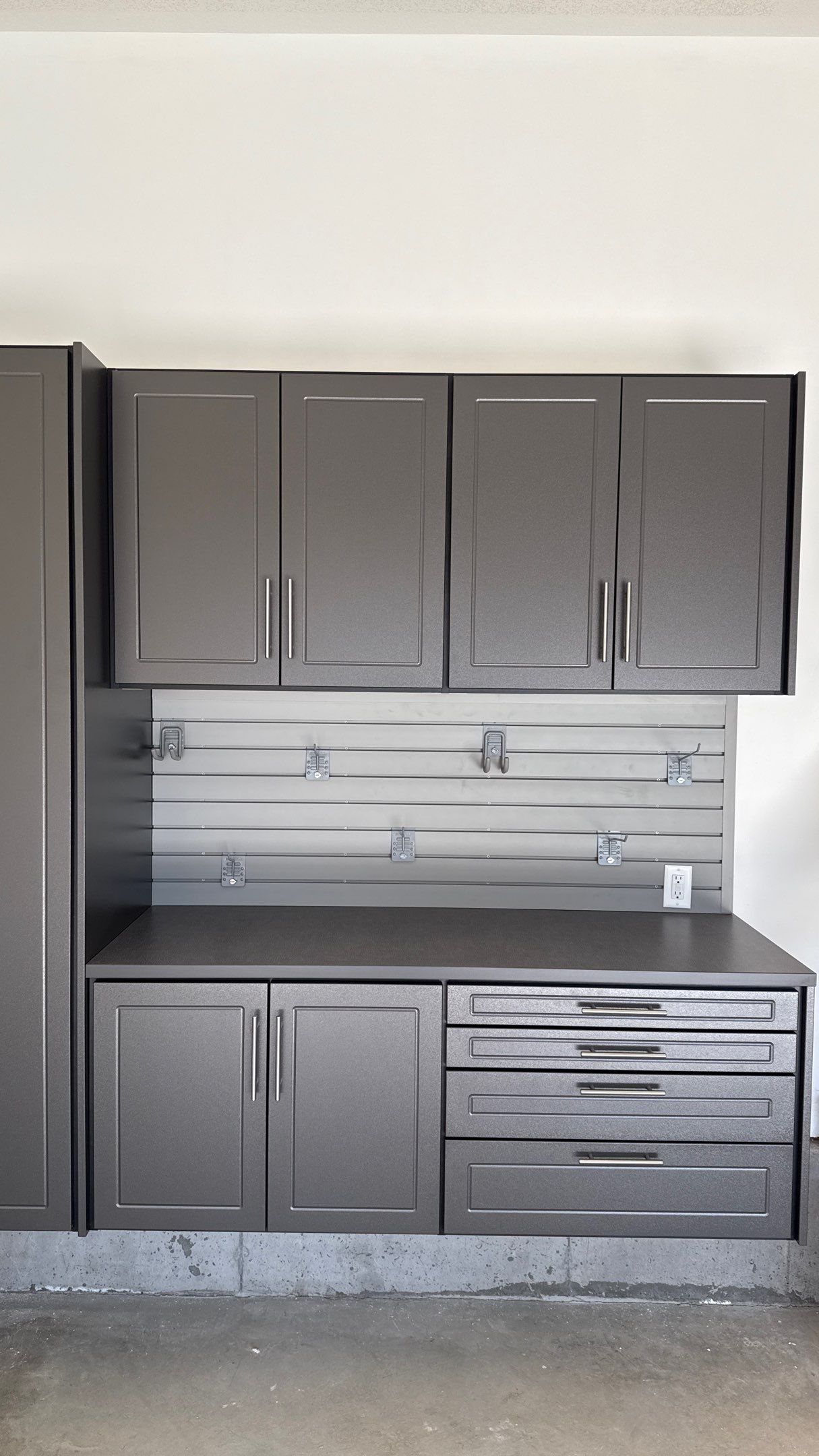 Nice Clean Look With These Pewter Cabinets by Banner Garage