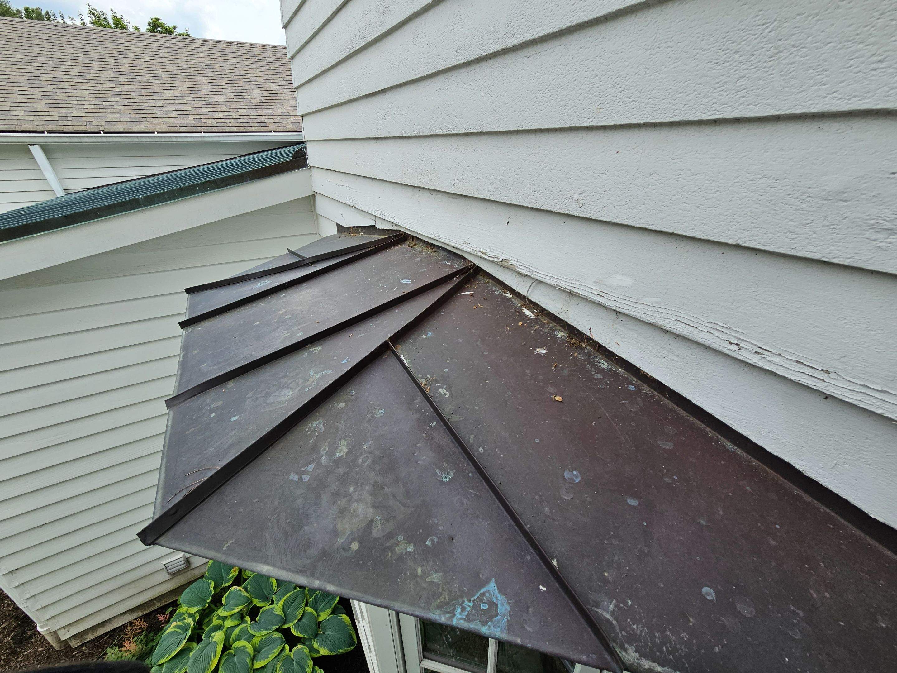 Copper Roof using Copper by Absolute Roofing and Construction